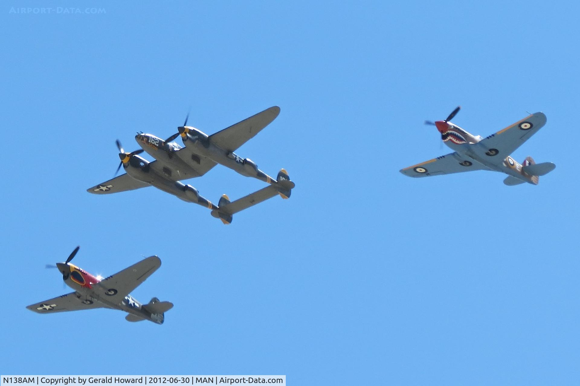 N138AM, 1943 Lockheed P-38J Lightning C/N 44-23314, P-38J in formation flyover during Nampa Airport airshow.
