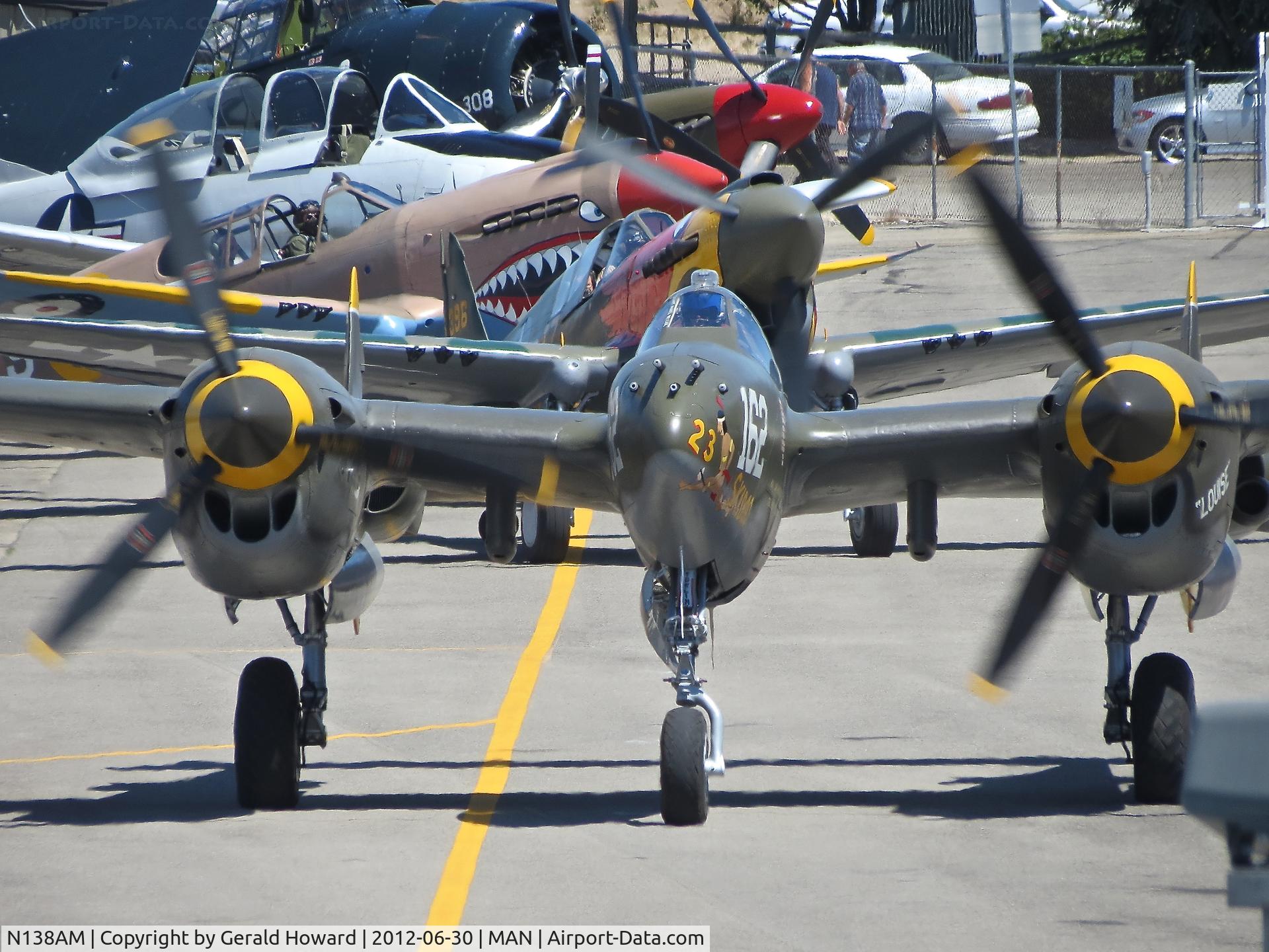 N138AM, 1943 Lockheed P-38J Lightning C/N 44-23314, Taxing from parking.