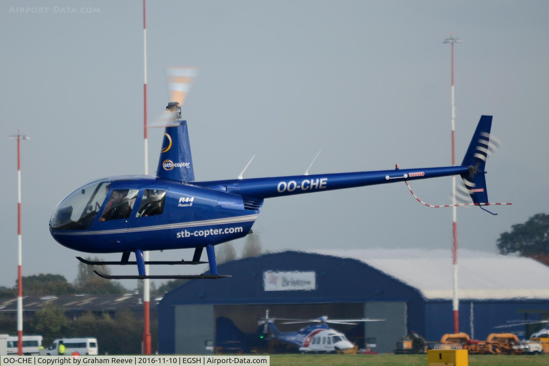 OO-CHE, 2008 Robinson R44 Raven II C/N 12316, Departing from Norwich.