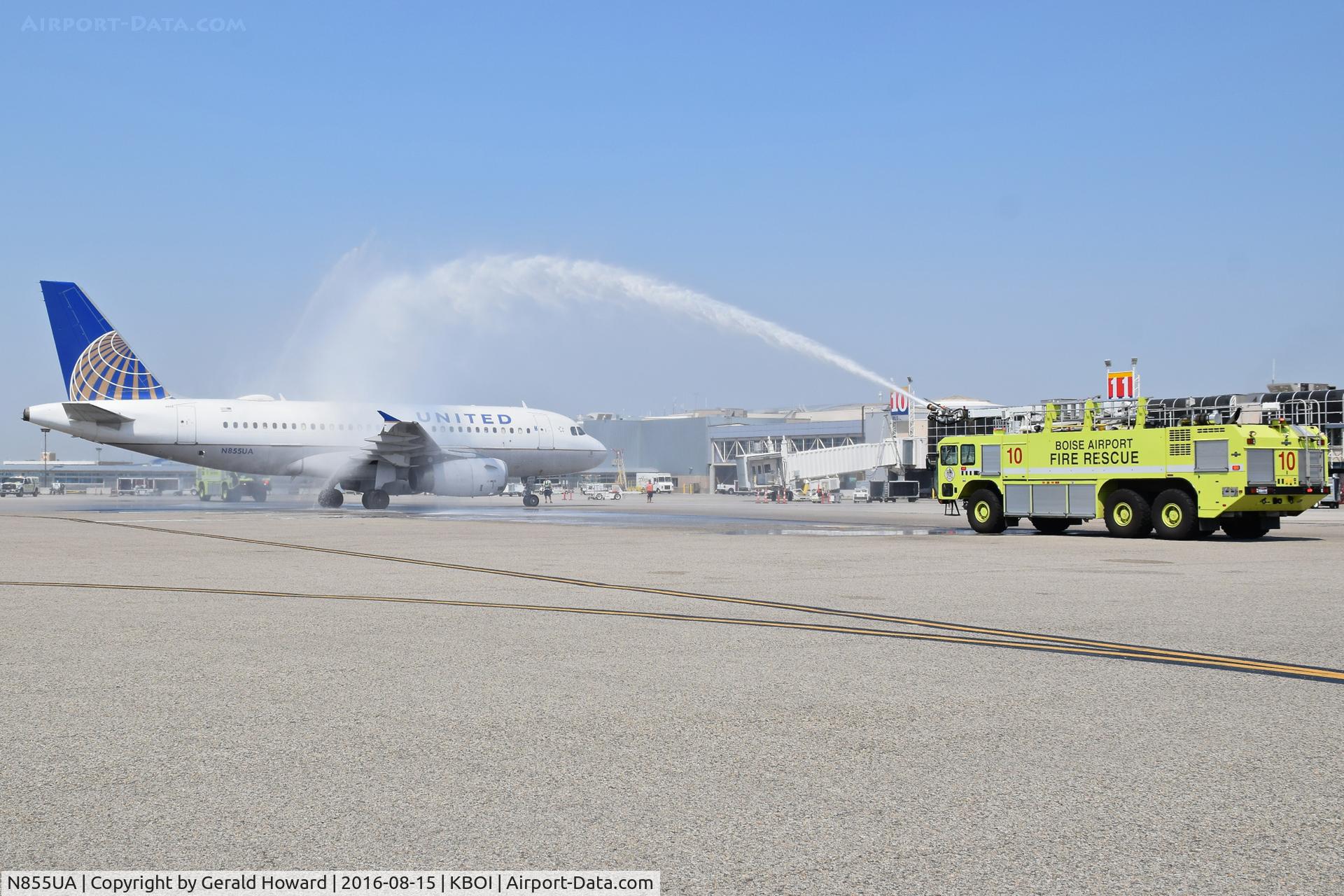 N855UA, 2002 Airbus A319-131 C/N 1737, Receiving a water welcome having several Olympic winners on board.
