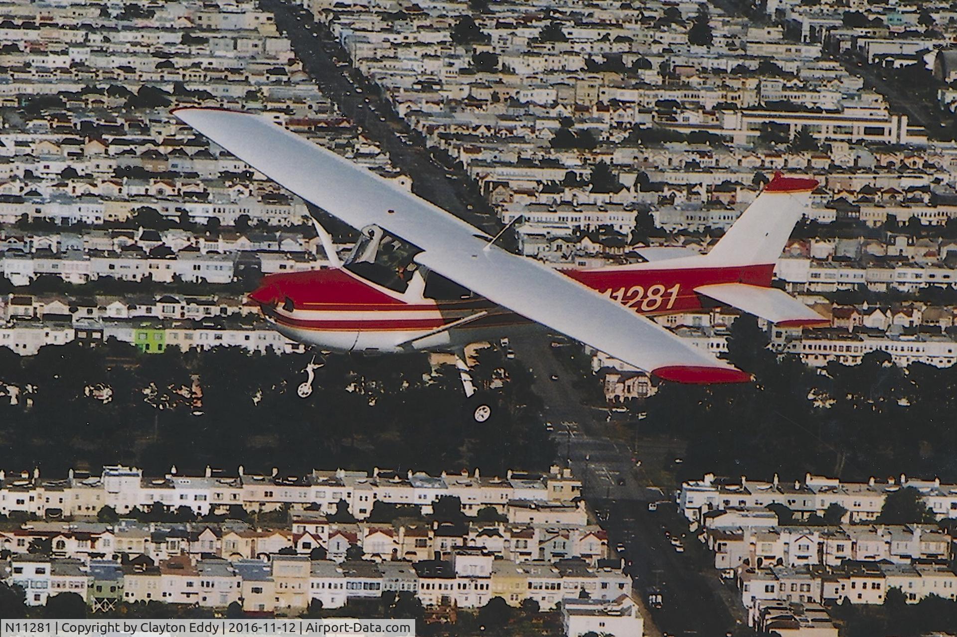 N11281, 1973 Cessna 150L C/N 15075295, N11281 over SF.