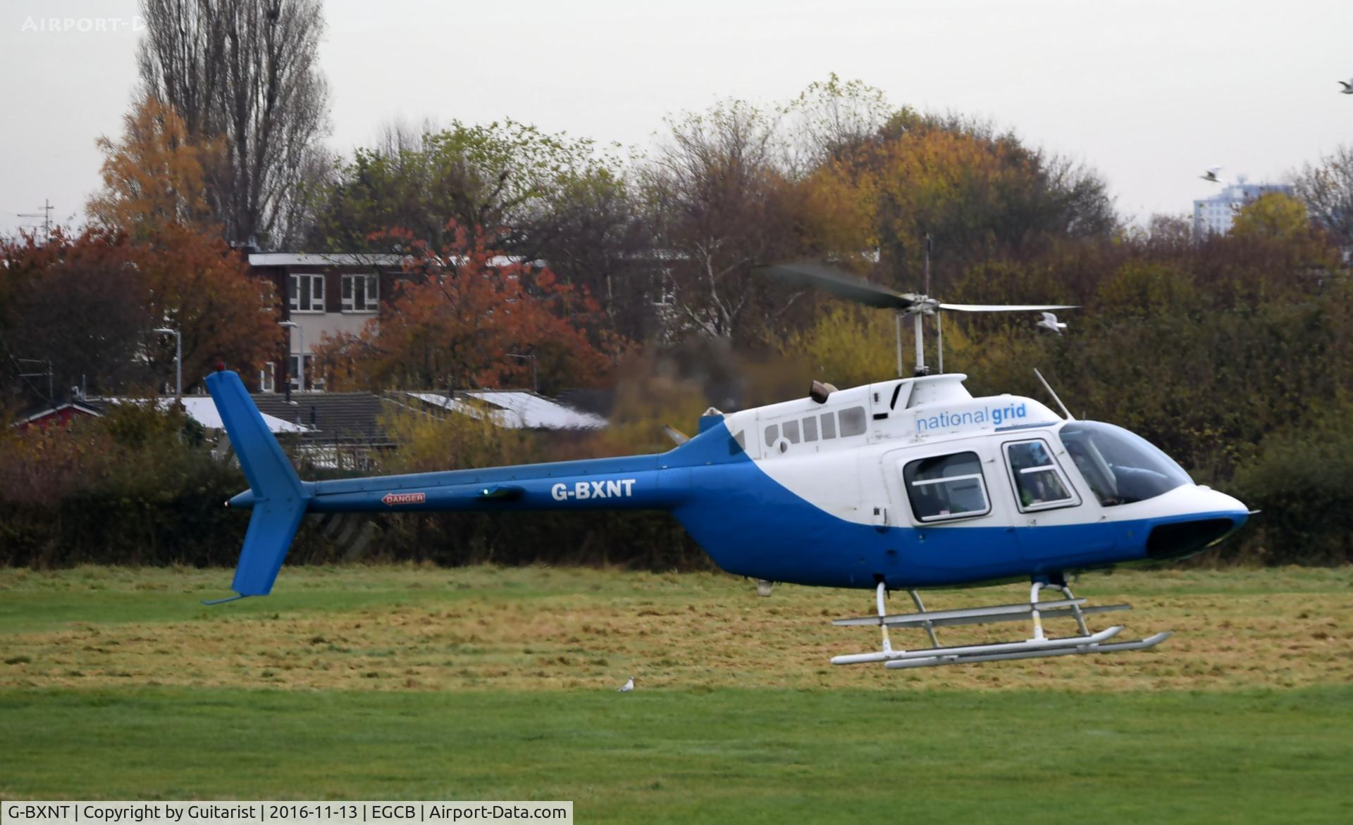 G-BXNT, 1977 Bell 206B JetRanger III C/N 2398, At City Airport Manchester (Barton)