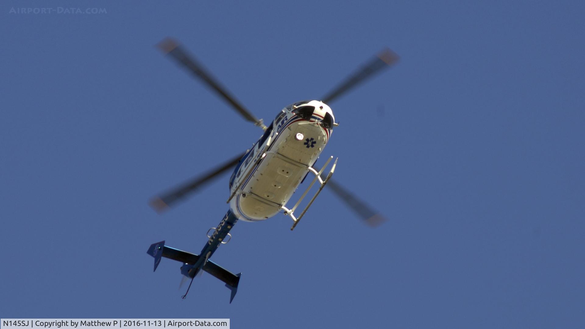 N145SJ, Eurocopter-Kawasaki EC-145 (BK-117C-2) C/N 9091, N145SJ Owned by Mercy Air Speeds by in a rush headed towards KCNO Chino Airport