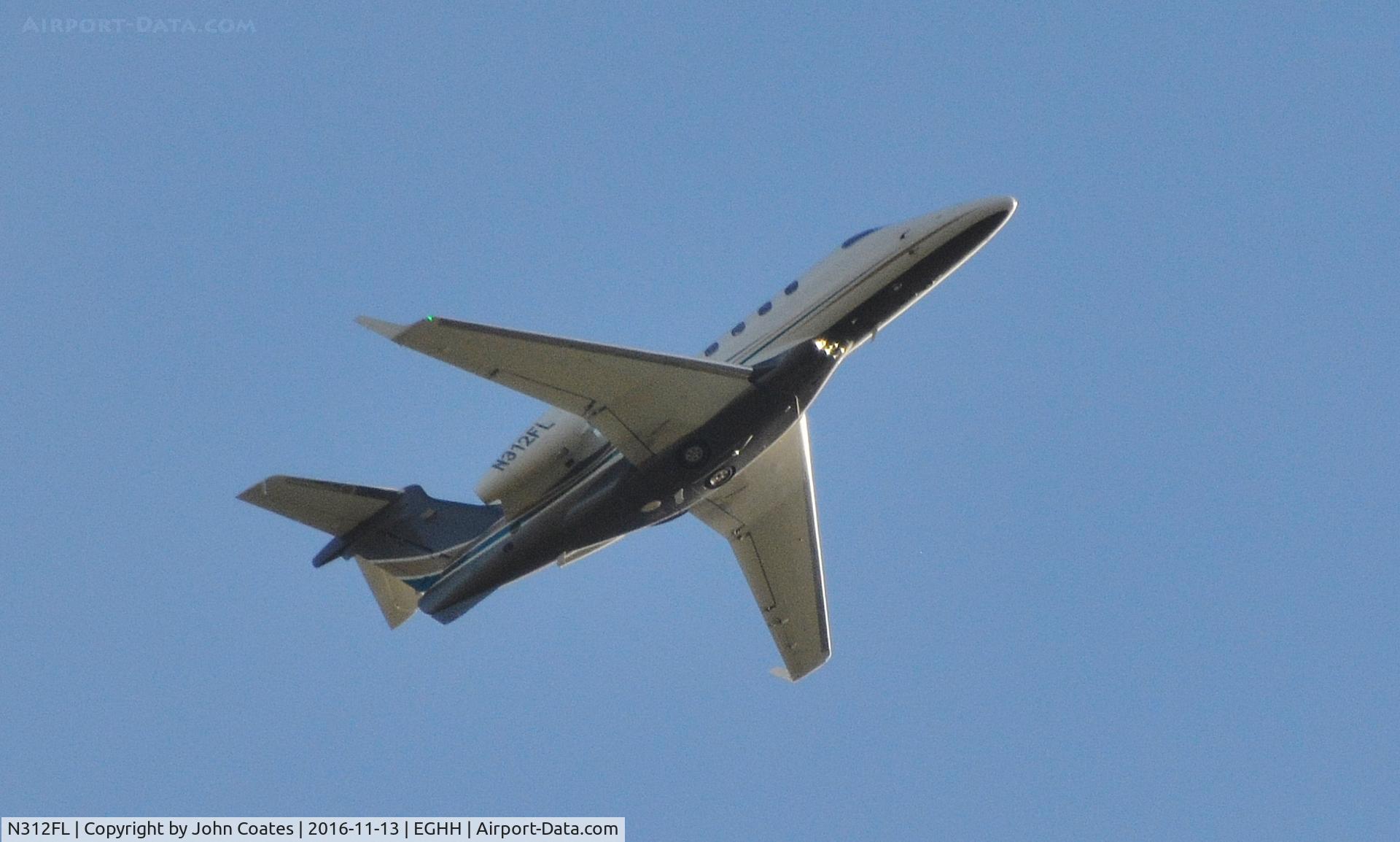 N312FL, 2011 Embraer EMB-505 Phenom 300 C/N 50500037, Departing off airport