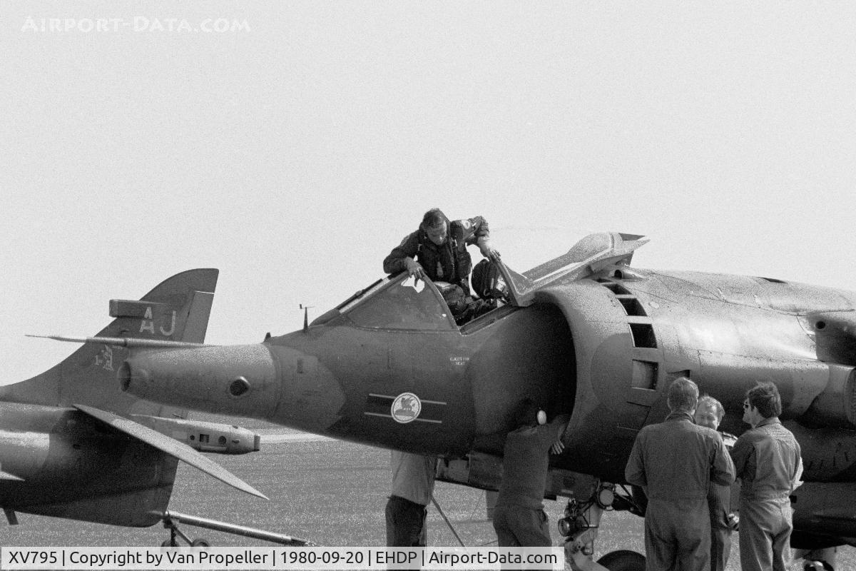 XV795, 1970 Hawker Siddeley Harrier GR.3 C/N 712045, Harrier GR.3 of RAF 3 squadron at De Peel air base, the Netherlands, 1980. The pilot is climbing in and the crew-chief is checking the engine air intake