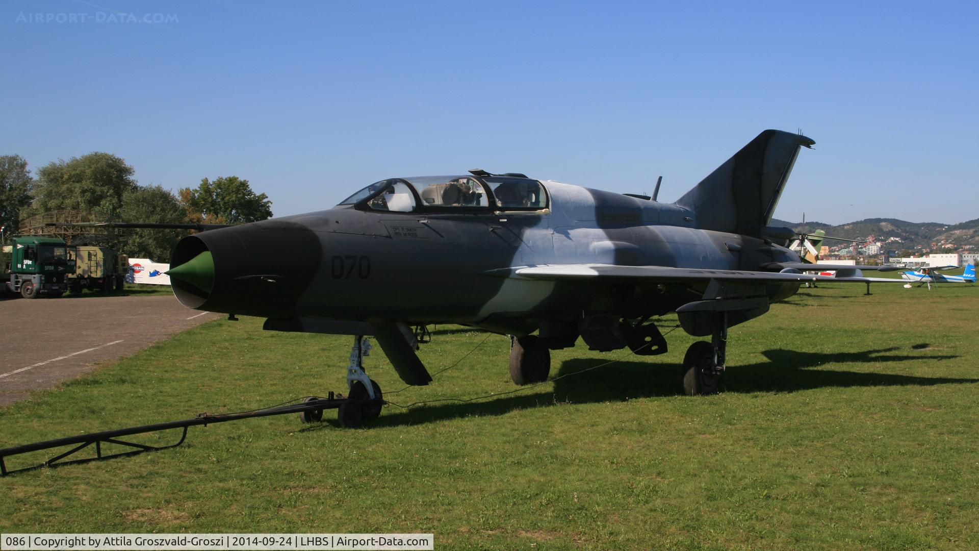 086, Mikoyan-Gurevich MiG-21UM C/N 516955086, Budaörs Airport, Hungary. 2014 was painted gray and BW AF04070 page number for filming.