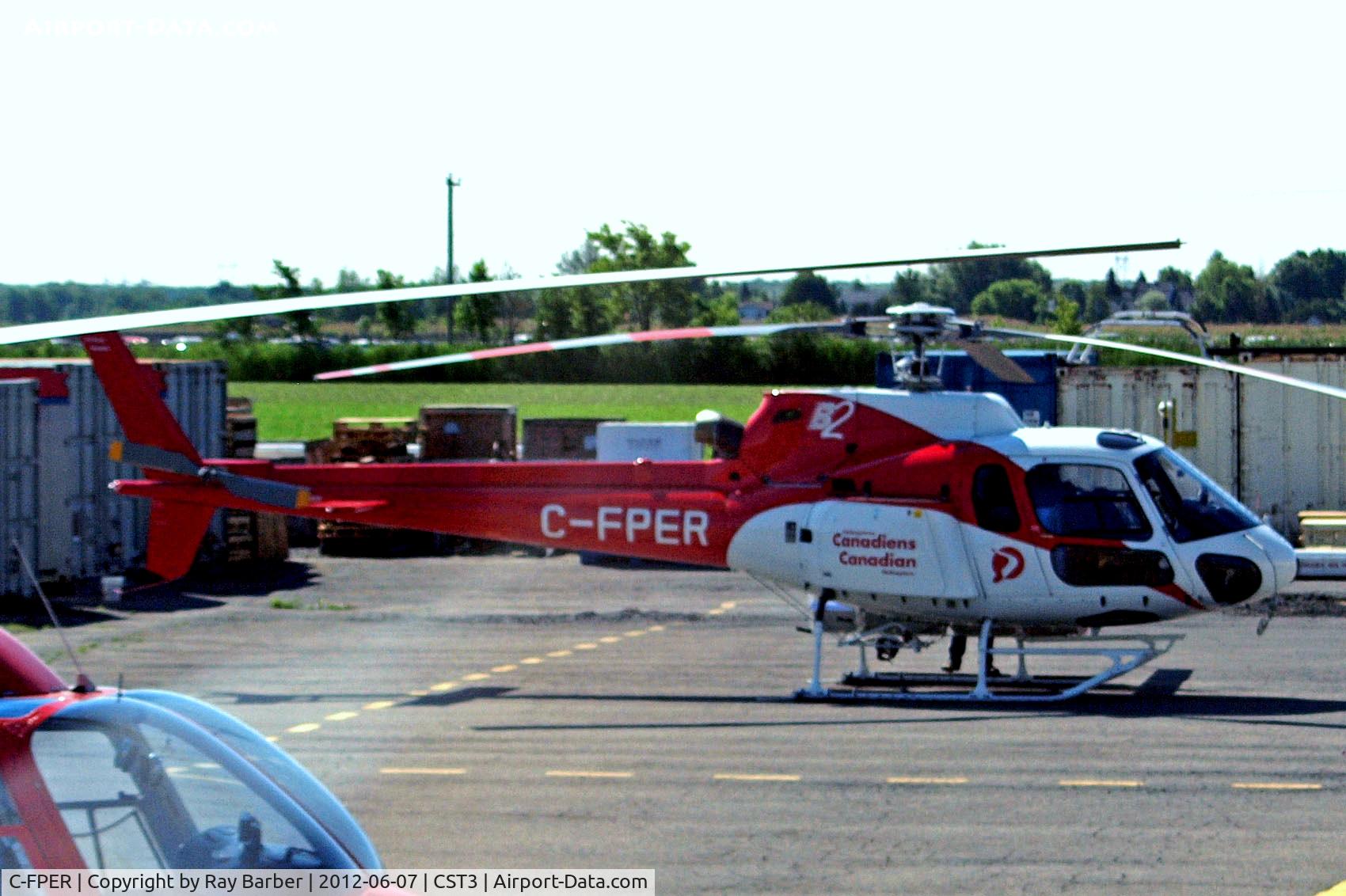 C-FPER, 1992 Aérospatiale AS-350BA Ecureuil C/N 2552, Aerospatiale AS.350BA Ecureuil [2552] (Canadian Helicopters) Les Cedres~C 07/06/2012. Taken through the glass of coach window
