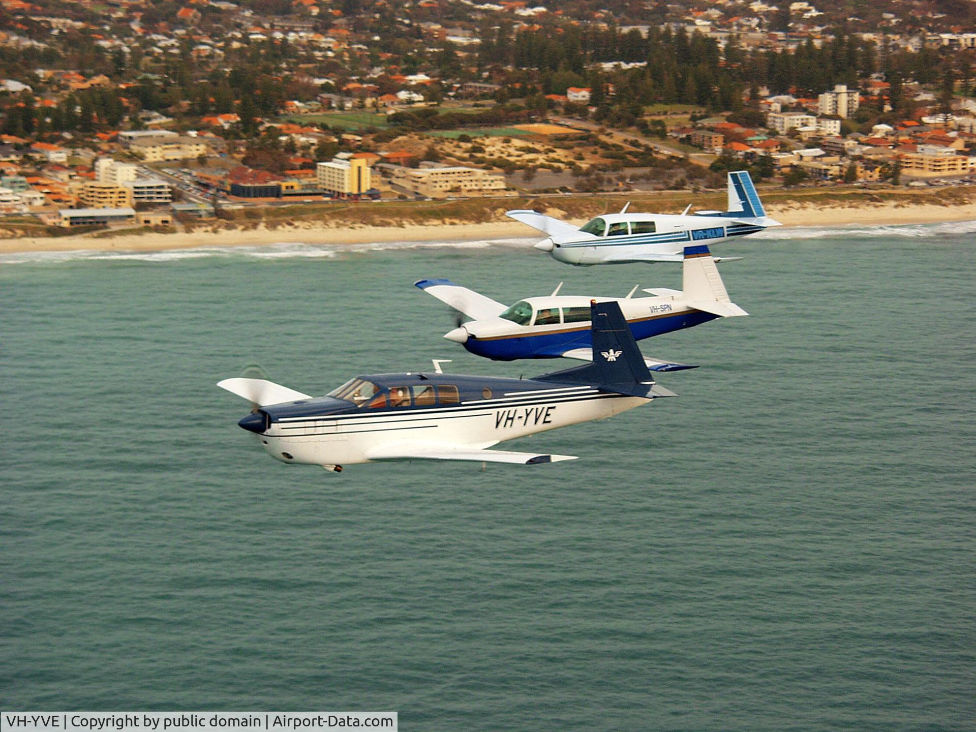 VH-YVE, 1968 Mooney M22 Mustang C/N 680010, M22 in formation with 2 M20J's
