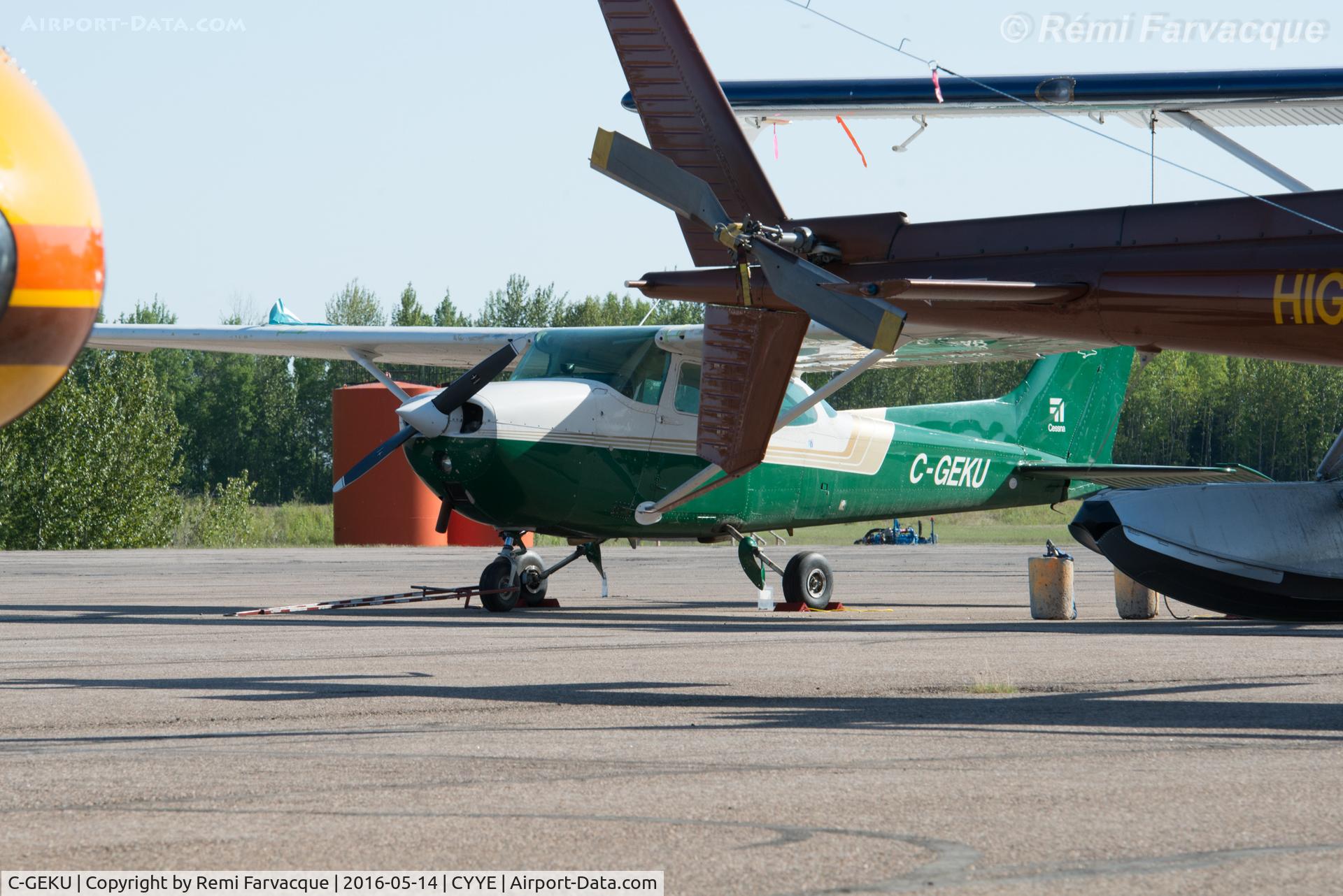 C-GEKU, 1976 Cessna 172M C/N 17266305, Parked by private hanger, east side of airport.