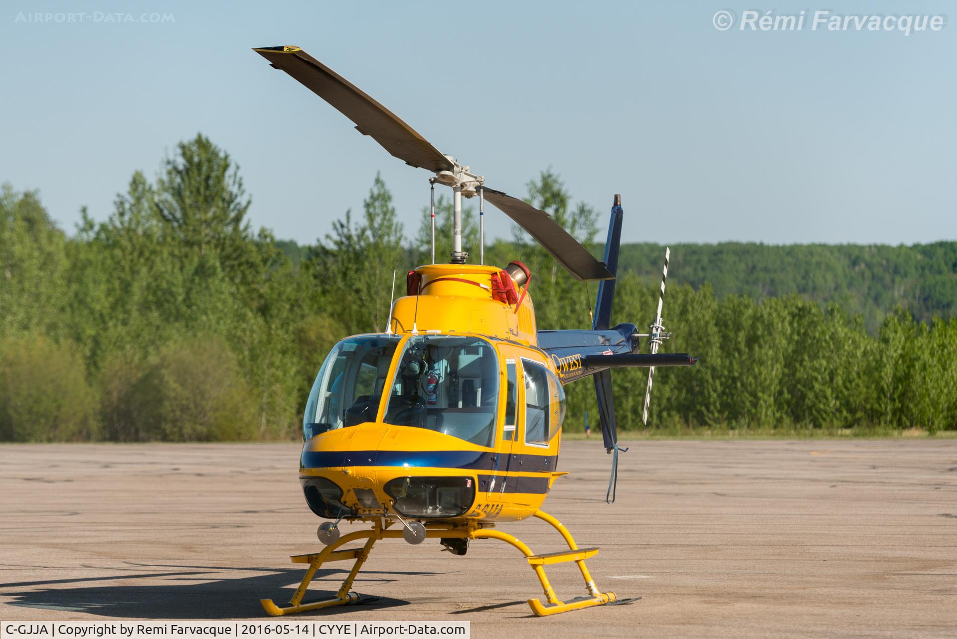 C-GJJA, 1976 Bell 206B JetRanger II C/N 2032, Parked in front of Highland Helicopters hangar.