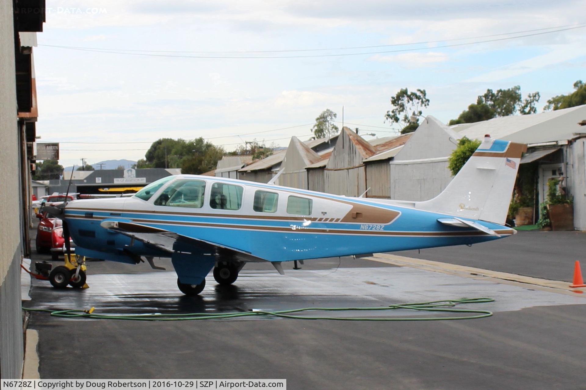 N6728Z, 1980 Beech A36TC Bonanza 36 C/N EA-57, 1980 Beech A36TC BONANZA, Continental TSIO-520-UB 300 Hp, 3 blade prop, 6 seats, washing the aircraft