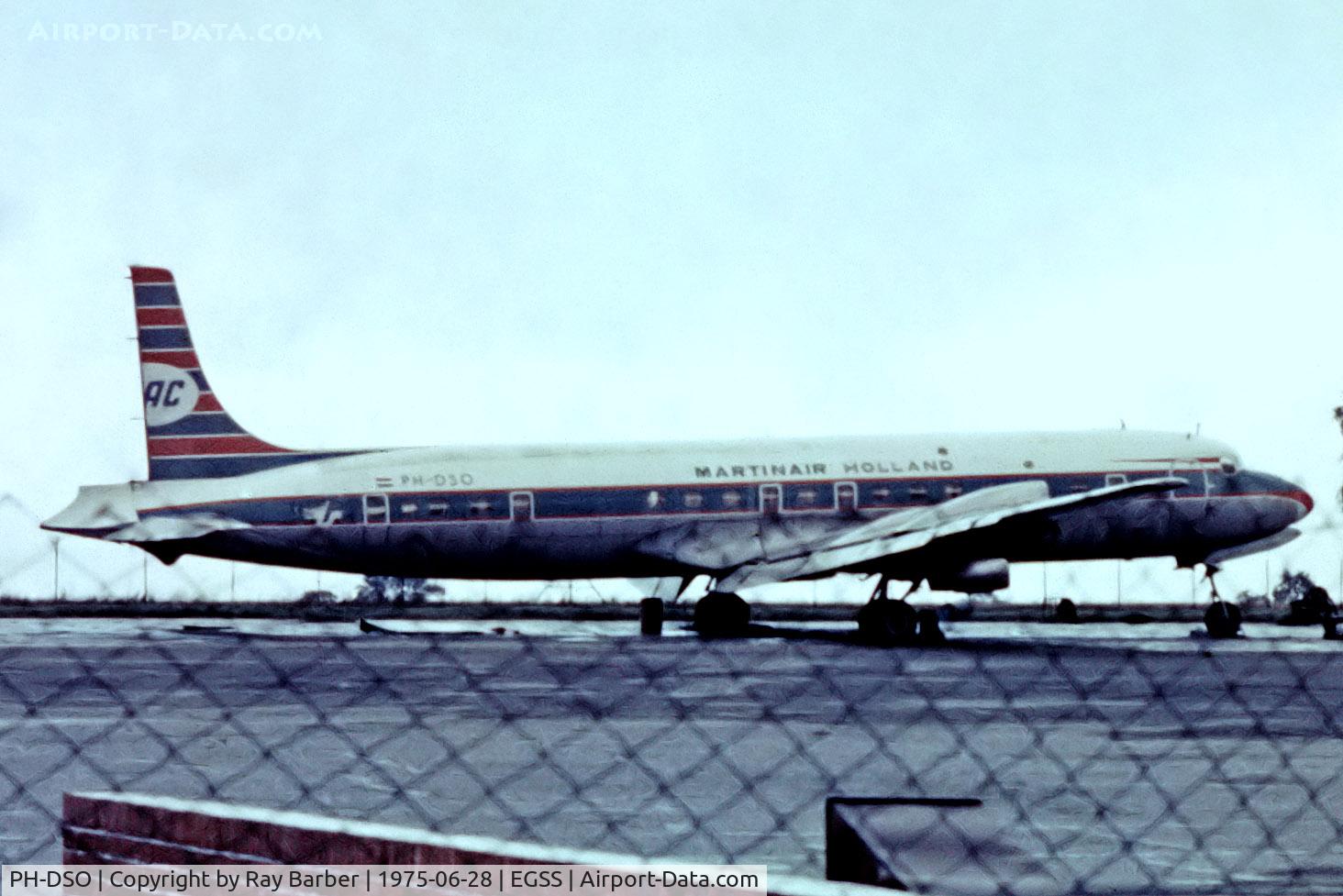 PH-DSO, 1958 Douglas DC-7C Seven Seas Seven Seas C/N 45547, Douglas DC-7C [45547] (Ex Martins Air Charter) Stansted~G 28/06/1975. From a slide. Taken through the fence.