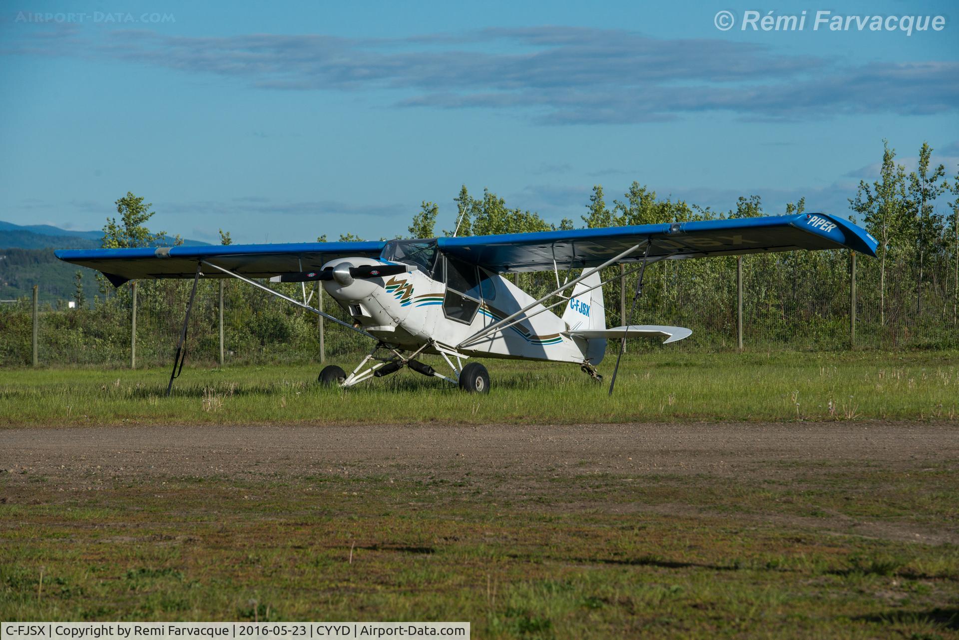 C-FJSX, 1947 Piper PA-12 Super Cruiser C/N 12-2386, Parked in east portion of airport with other private craft.