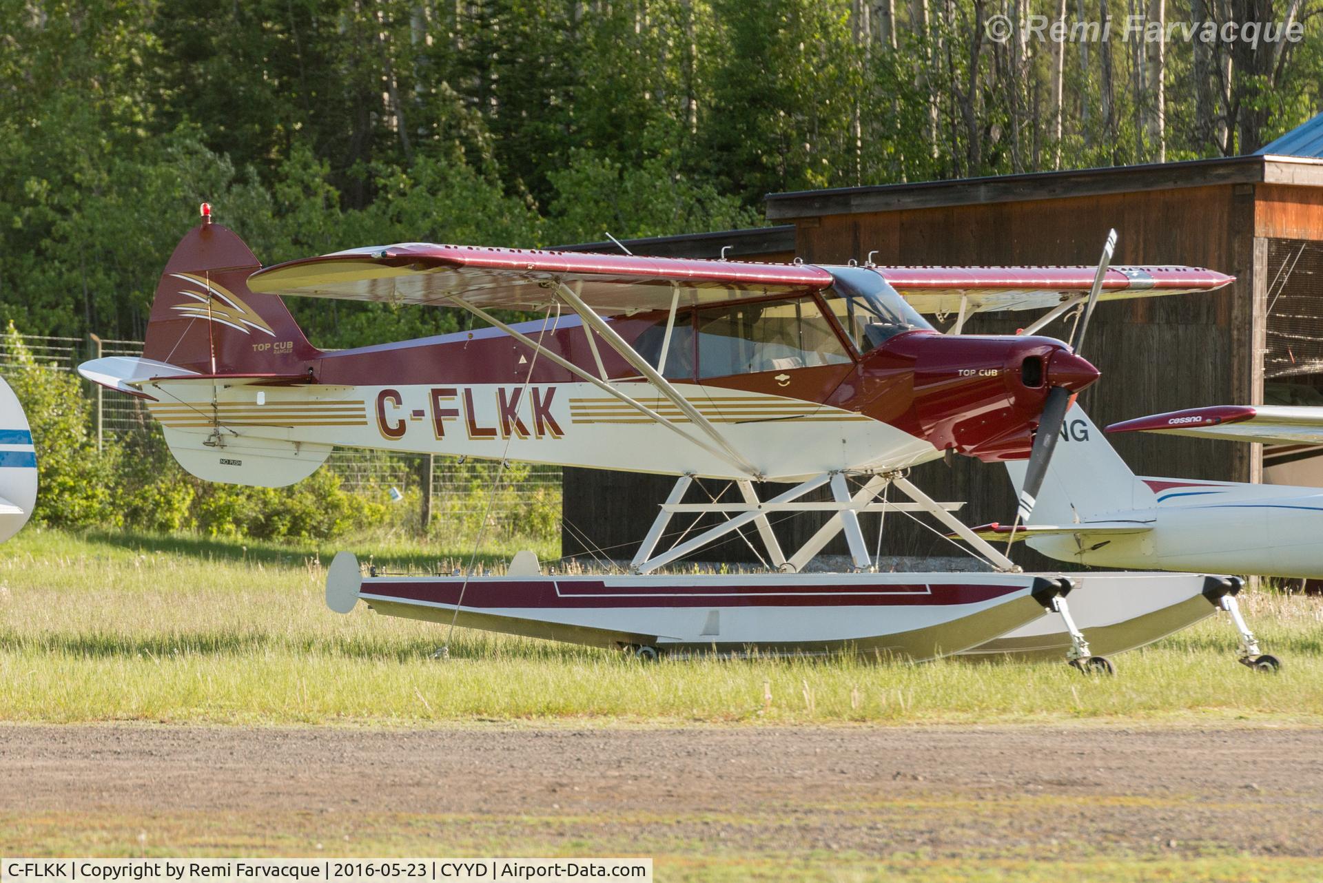 C-FLKK, 2008 Cub Crafters CC18-180 Top Club C/N CC18-0026, Parked at east end of airport with other private craft.