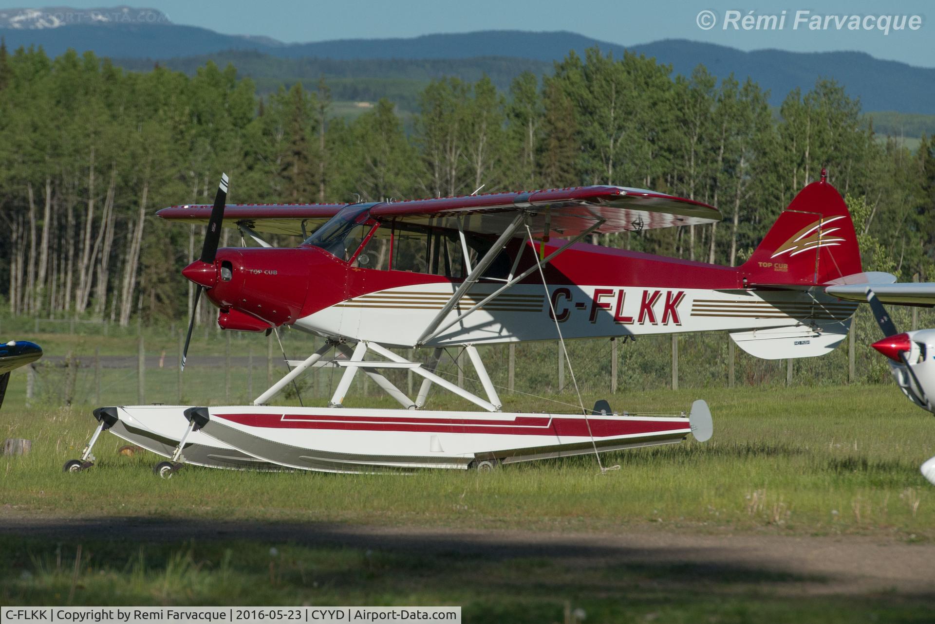 C-FLKK, 2008 Cub Crafters CC18-180 Top Club C/N CC18-0026, Parked at east end of airport with other private craft.