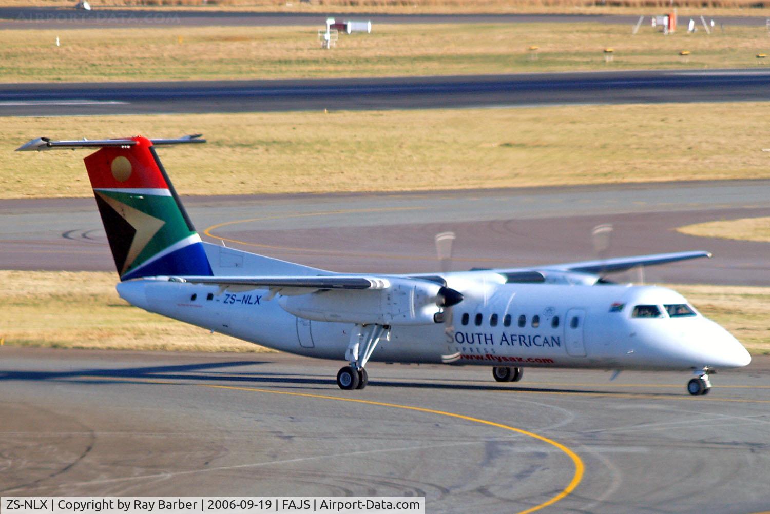 ZS-NLX, De Havilland Canada DHC-8-315 Dash 8 C/N 348, De Havilland Canada DHC-8-315 Dash 8 [348] (South African Express) Johannesburg Int'l~ZS 19/09/2006. Taken through the glass of the terminal.
