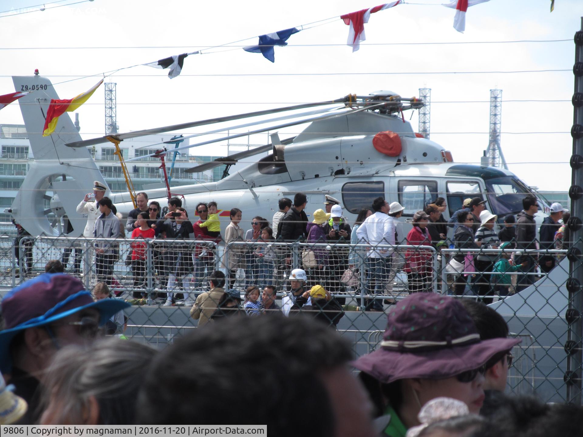 9806, Harbin Z9 C/N 0590, as seen from dockside through mass of viewing public!