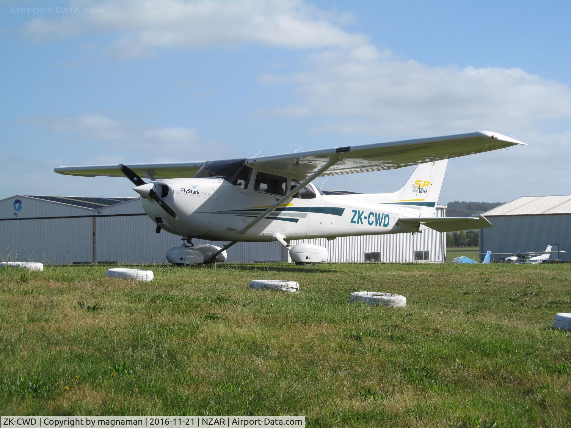 ZK-CWD, 2002 Cessna 172S C/N 172S9039, on grass parking