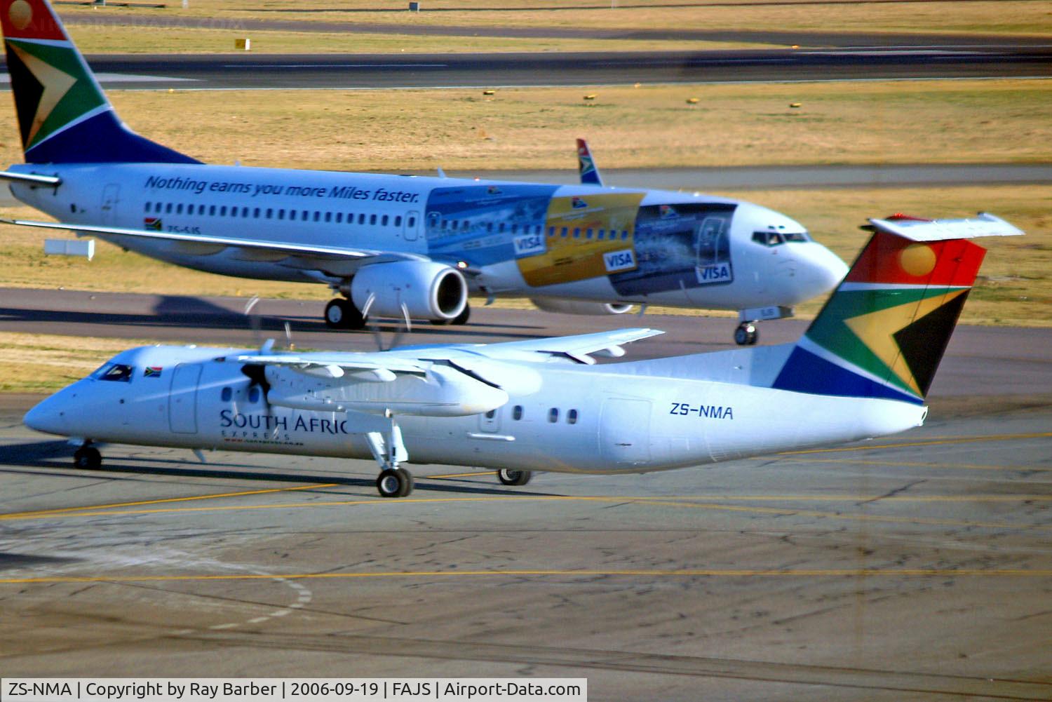 ZS-NMA, 1994 De Havilland Canada DHC-8-311 Dash 8 C/N 358, De Havilland Canada DHC-8-311 Dash 8 [358] (South African Express) Johannesburg Int~ZS 19/09/2006. Taken through the glass of the terminal.