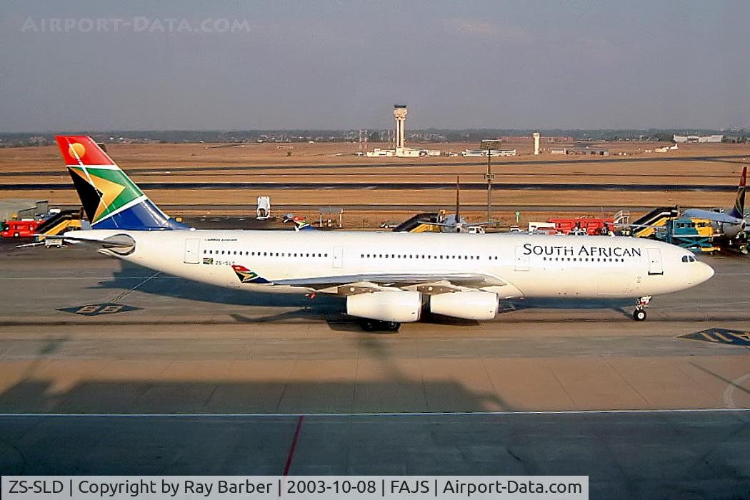 ZS-SLD, 1993 Airbus A340-211 C/N 019, Airbus A340-212 [019] (South African Airways) Johannesburg Int~ZS 08/10/2003.Taken through the glass of the terminal.
