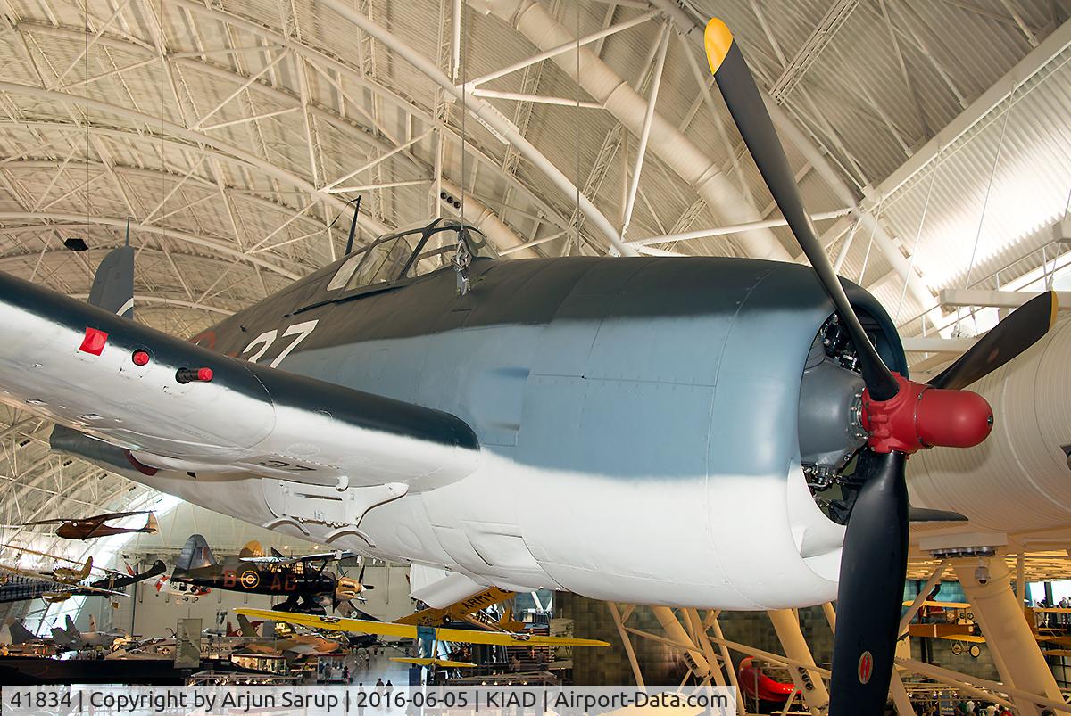 41834, Grumman F6F-3K Hellcat C/N A-3100, Hellcat Bu.No. 41834 was built at Bethpage in Feb. 1944. Assigned to VF-15 aboard USS Hornet (CV-12), it made its way to Hawaii. It was then assigned to VF-3 and VF-83.  It was converted into a drone and used for radioactivity tests at Bikini Atoll, 1946.