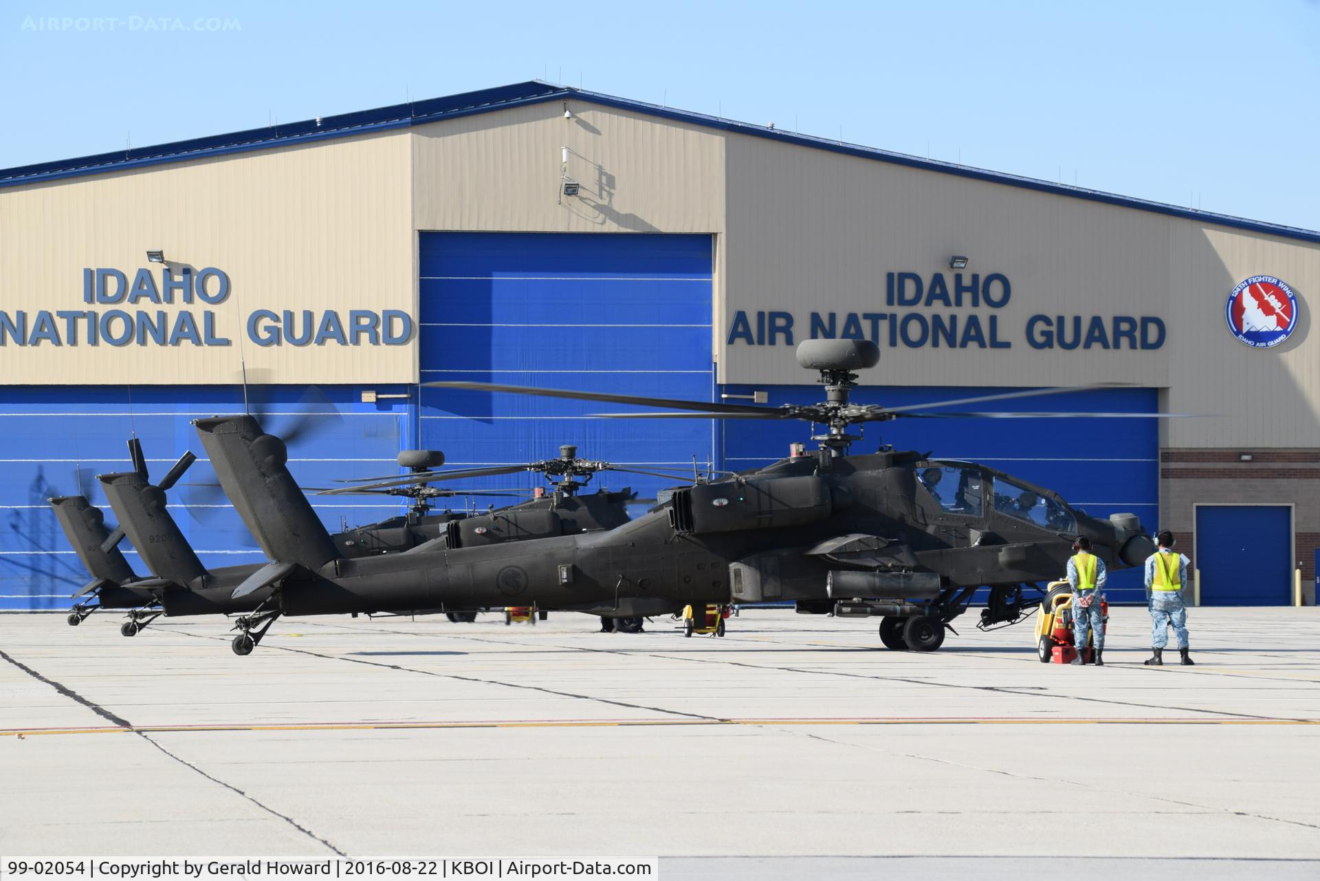 99-02054, Boeing AH-64D Longbow Apache C/N SN005, Three Royal Singapore AH-64D Longbows parked on Air Guard ramp for training.