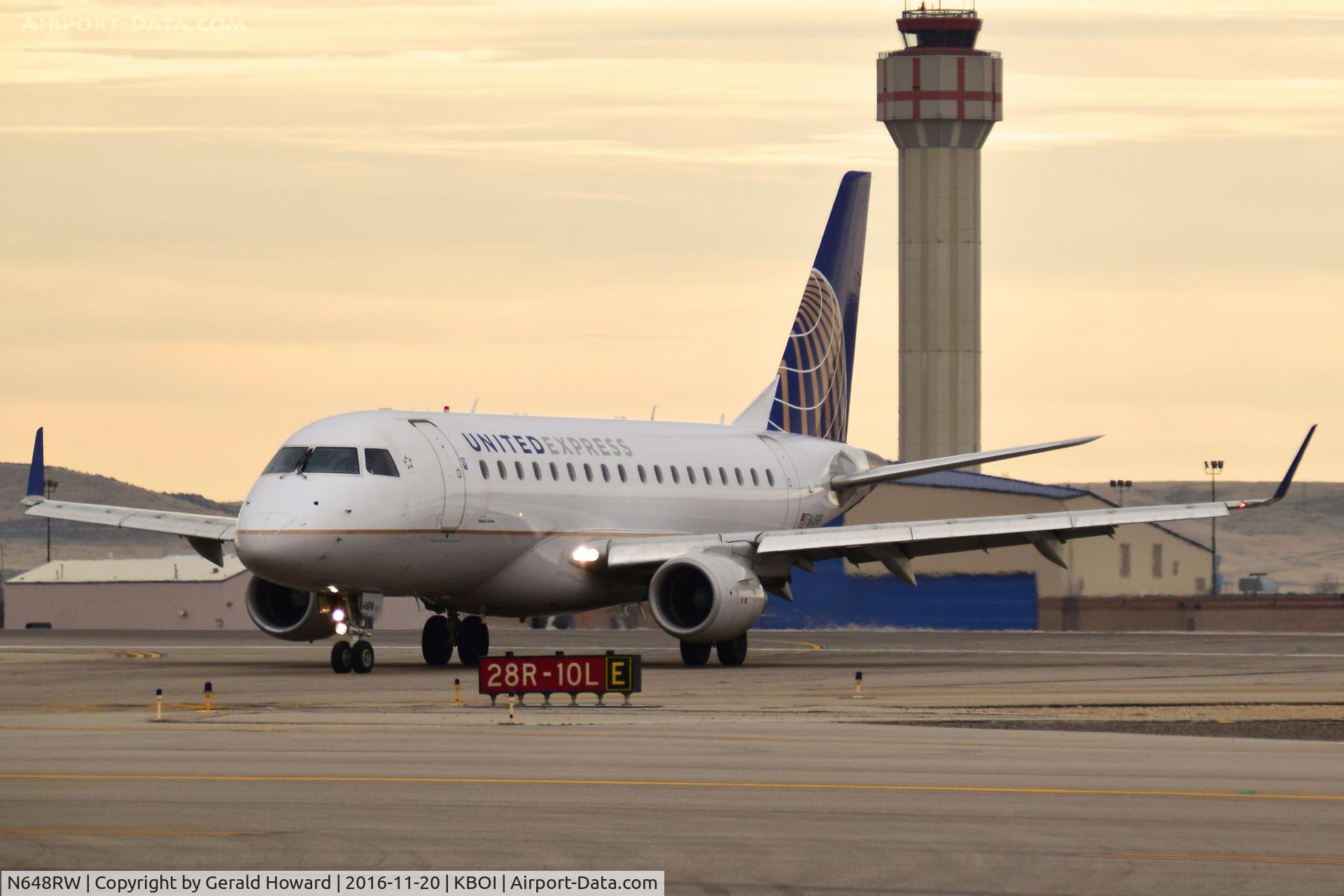 N648RW, 2005 Embraer 170SE (ERJ-170-100SE) C/N 17000068, Turning off RWY 28R.