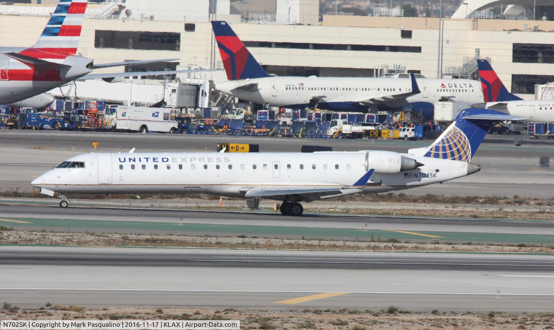 N702SK, 2004 Bombardier CRJ-701ER (CL-600-2C10) Regional Jet C/N 10136, CL-600-2C10