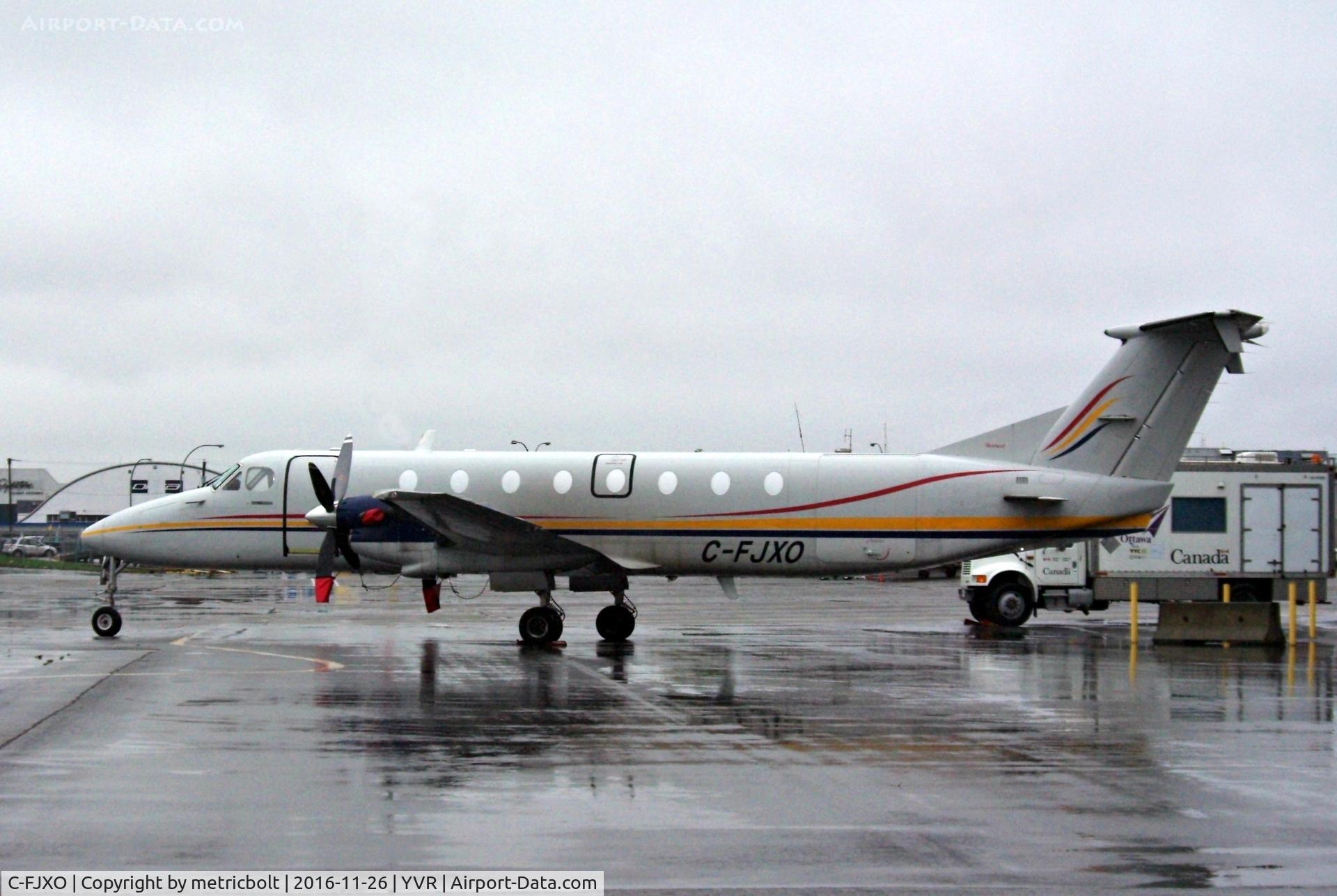 C-FJXO, 1990 Beech 1900C-1 C/N UC-124, Seen at YVR South Terminal