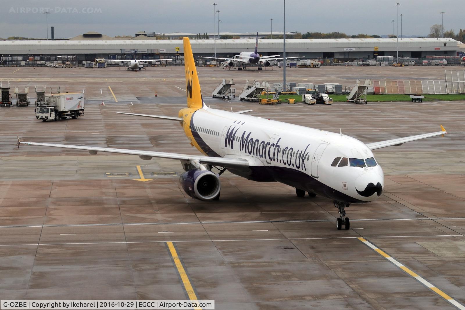 G-OZBE, 2002 Airbus A321-231 C/N 1707, Second picture of same plane just as it was docking on Manchester airport gate 10 at terminal 2.
