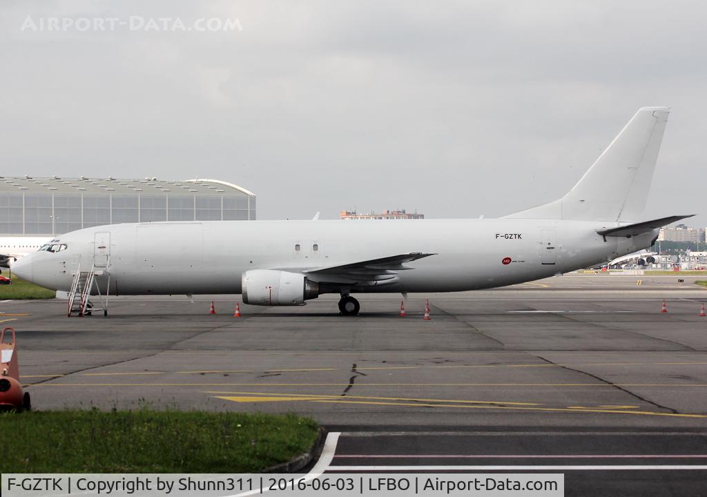 F-GZTK, 1991 Boeing 737-4Q8 C/N 24709/2115, Parked at the Cargo area...