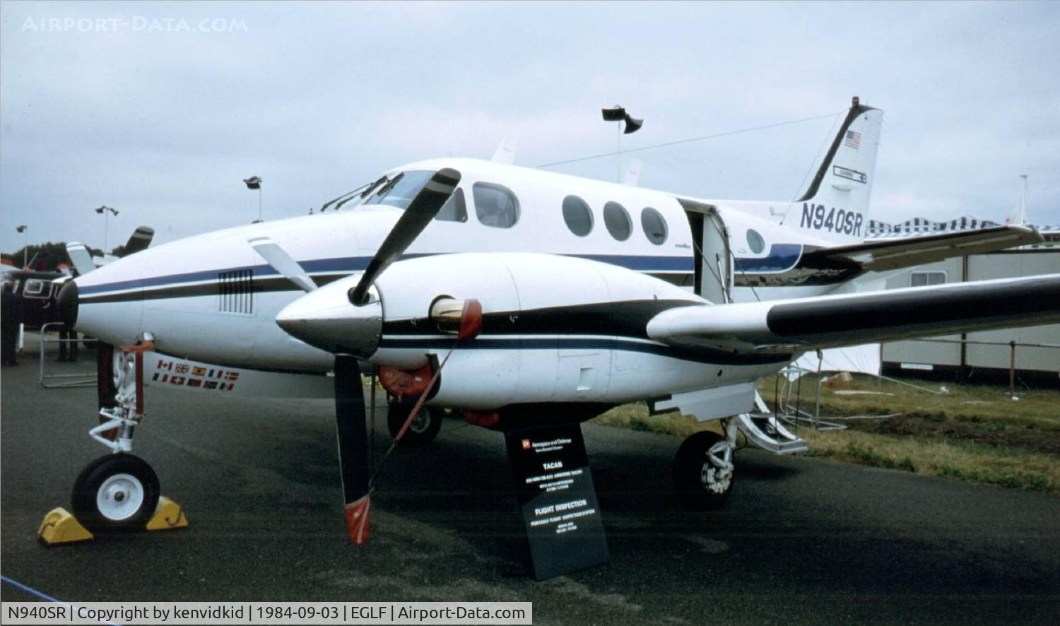 N940SR, 1975 Beech E90 King Air C/N LW-158, At the 1984 Farnborough International Air Show. Scanned from slide.