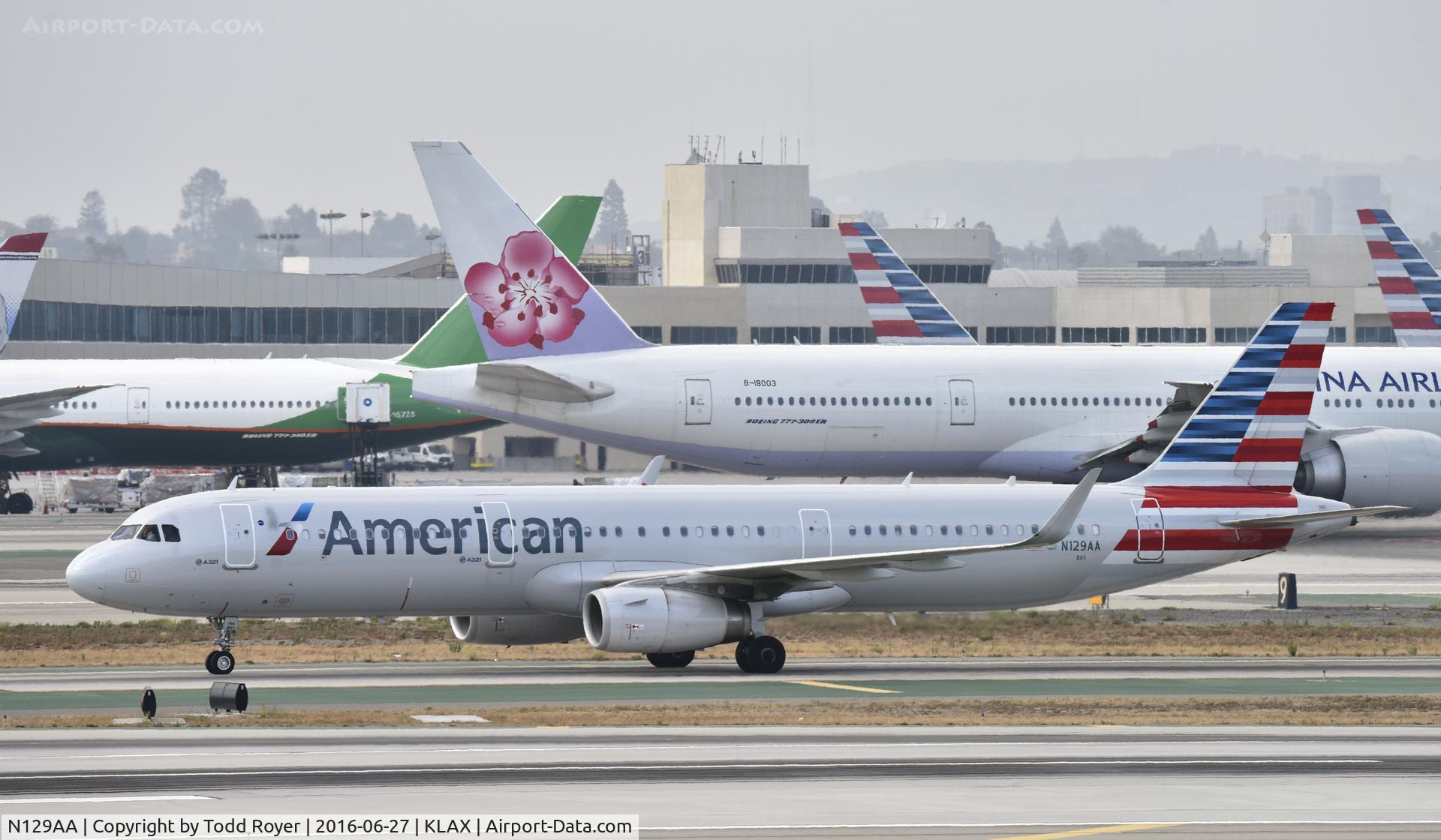 N129AA, 2014 Airbus A321-231 C/N 6401, Arriving at LAX on 25L