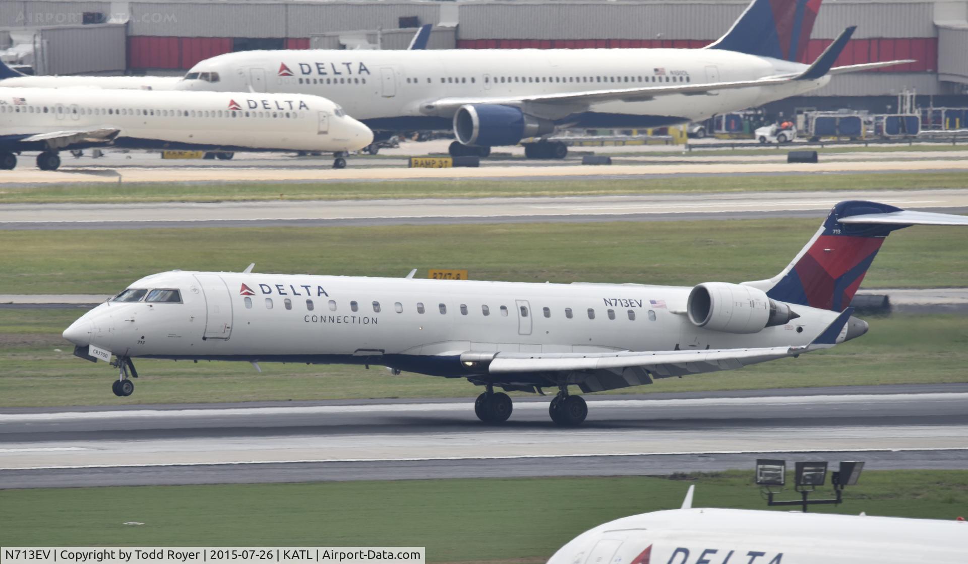 N713EV, 2003 Bombardier CRJ-701 (CL-600-2C10) Regional Jet C/N 10081, Arriving at Atlanta