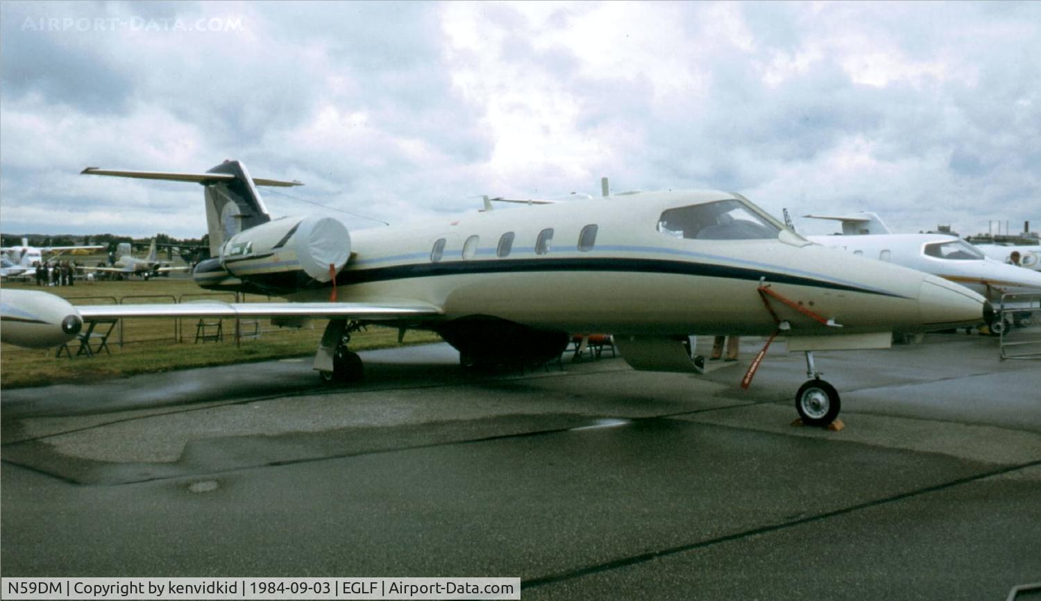 N59DM, 1978 Gates Learjet 35A C/N 205, At the 1984 Farnborough International Air Show. Scanned from slide.