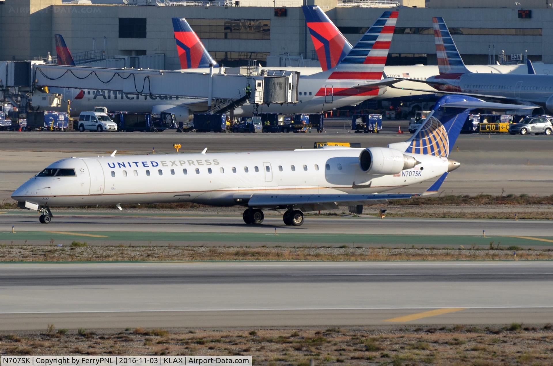 N707SK, 1999 Bombardier CRJ-701ER (CL-600-2C10) Regional Jet C/N 10003, United Express CL700