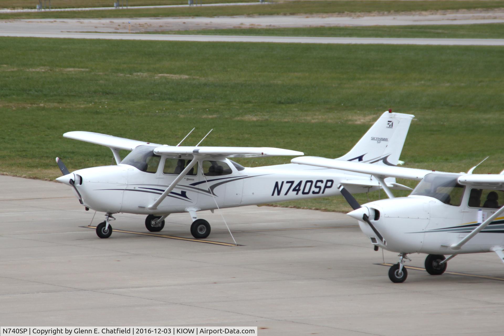 N740SP, 2000 Cessna 172S C/N 172S8671, Spied on the ramp, from the observation deck