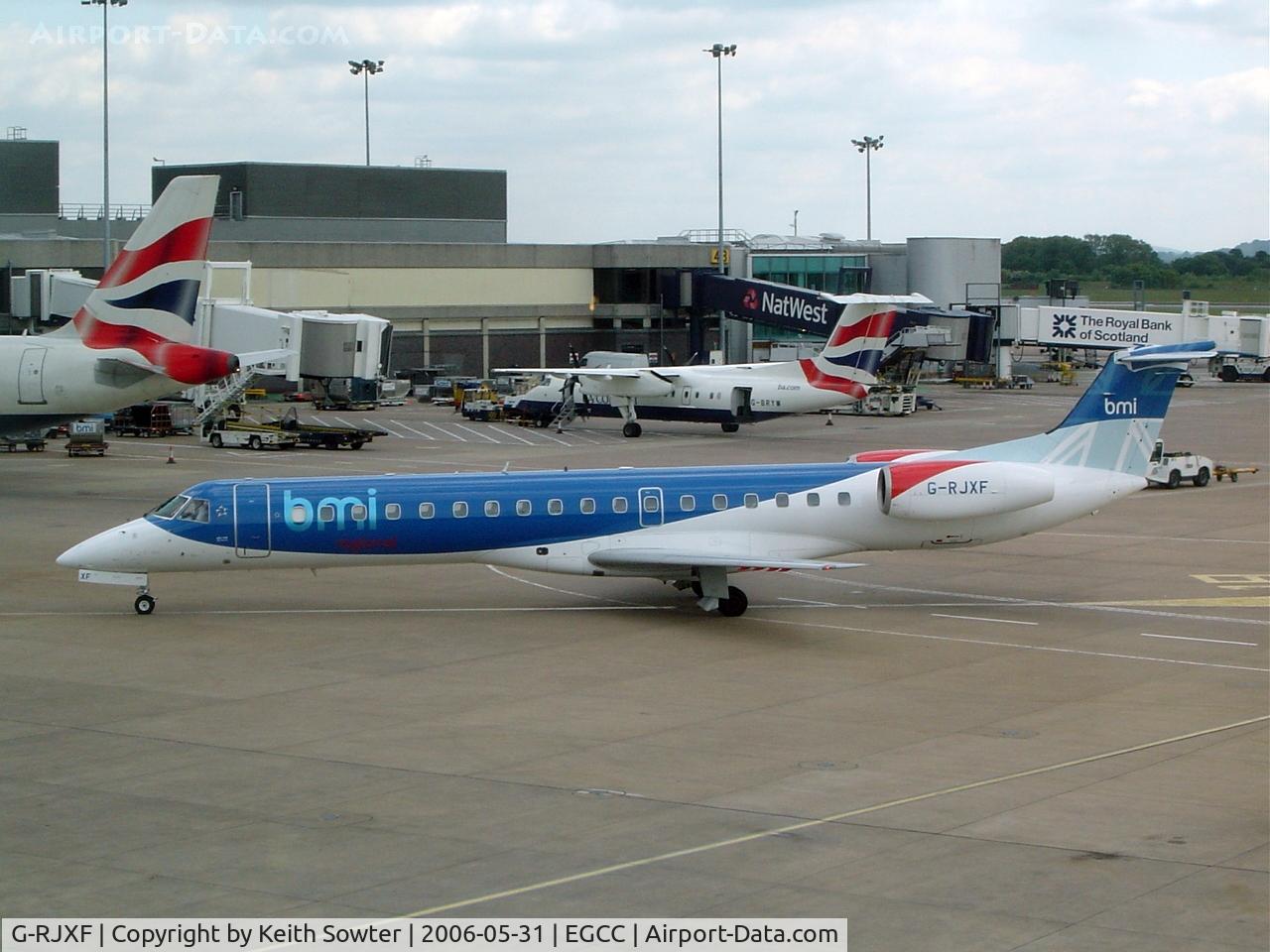 G-RJXF, 2000 Embraer EMB-145EP (ERJ-145EP) C/N 145280, Taken through tinted glass