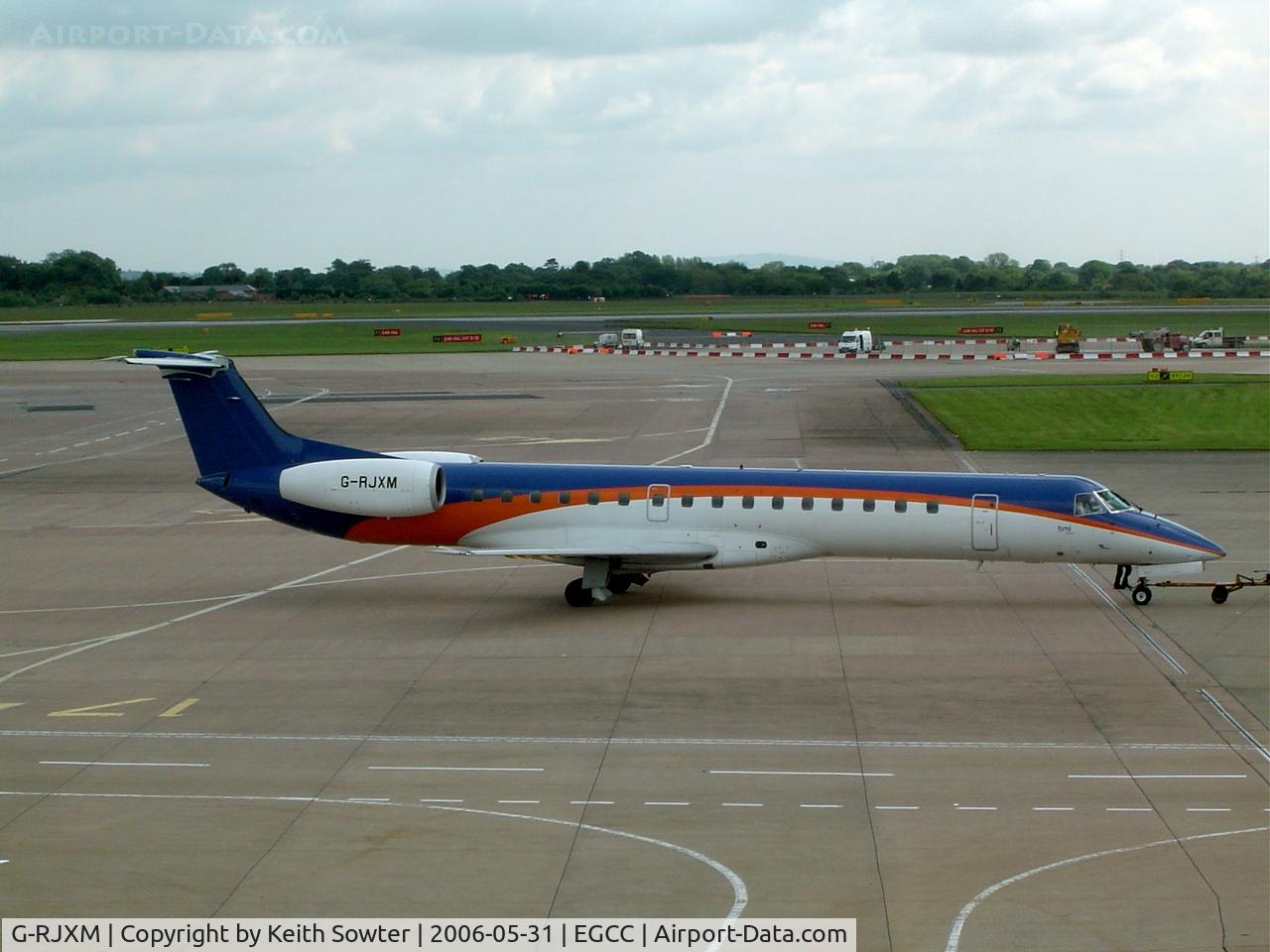 G-RJXM, 2000 Embraer ERJ-145MP (EMB-145MP) C/N 145216, Taken through tinted glass