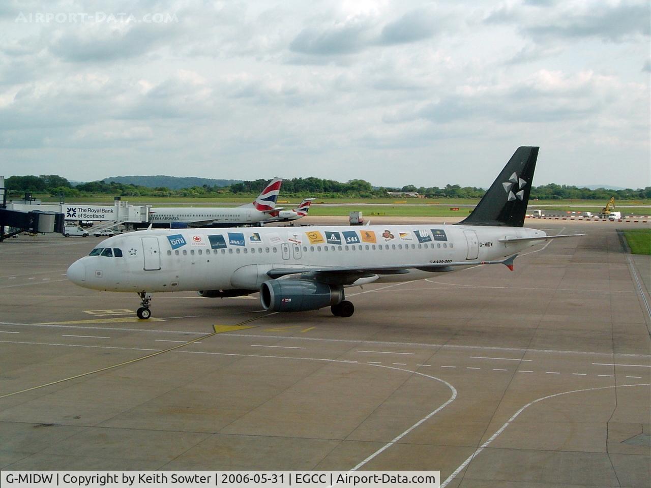 G-MIDW, 2000 Airbus A320-232 C/N 1183, Taken through tinted glass