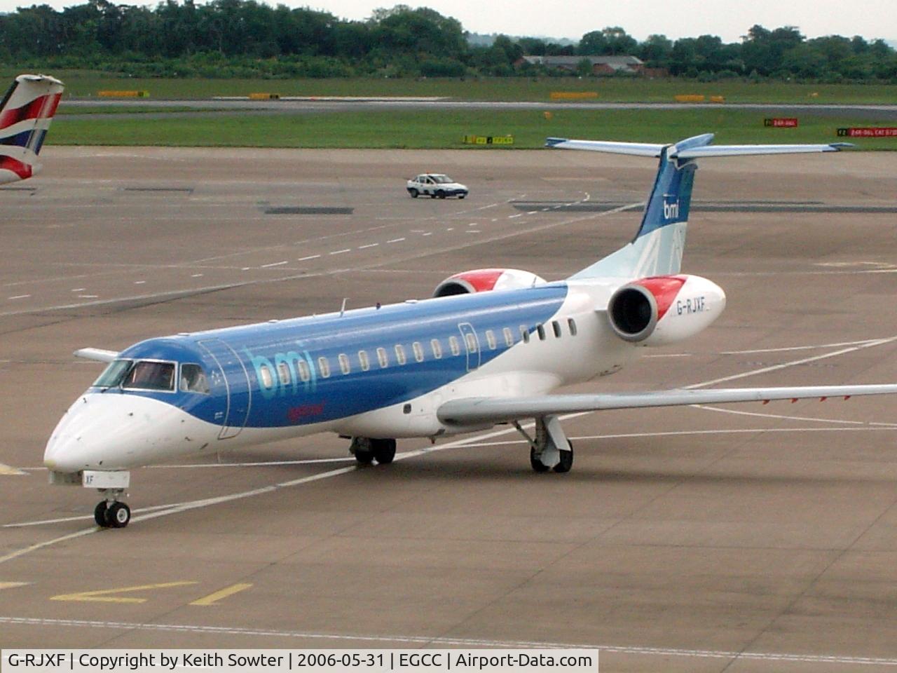 G-RJXF, 2000 Embraer EMB-145EP (ERJ-145EP) C/N 145280, Taken through tinted glass