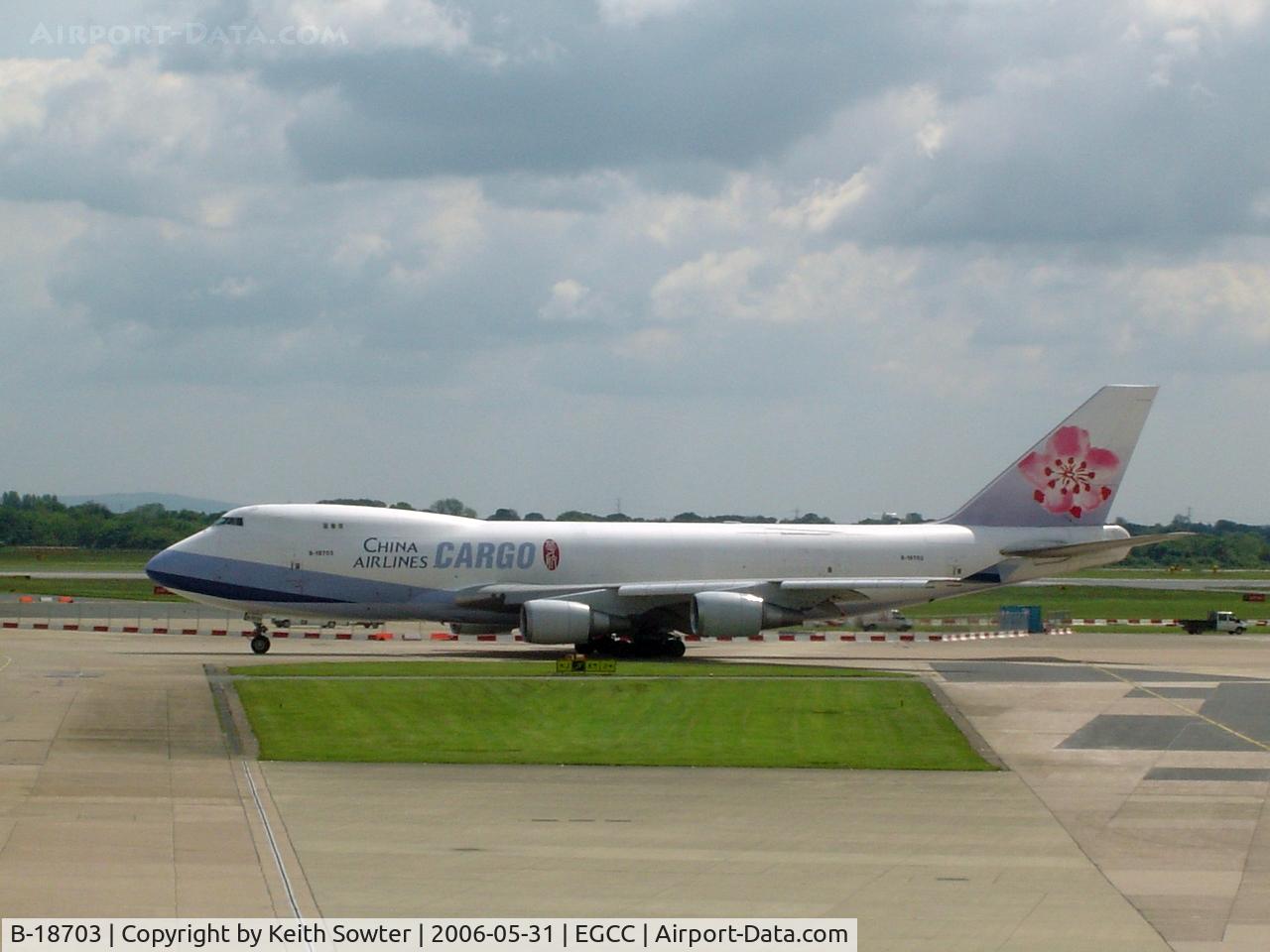 B-18703, 2000 Boeing 747-409F/SCD C/N 30761, Taken through tinted glass