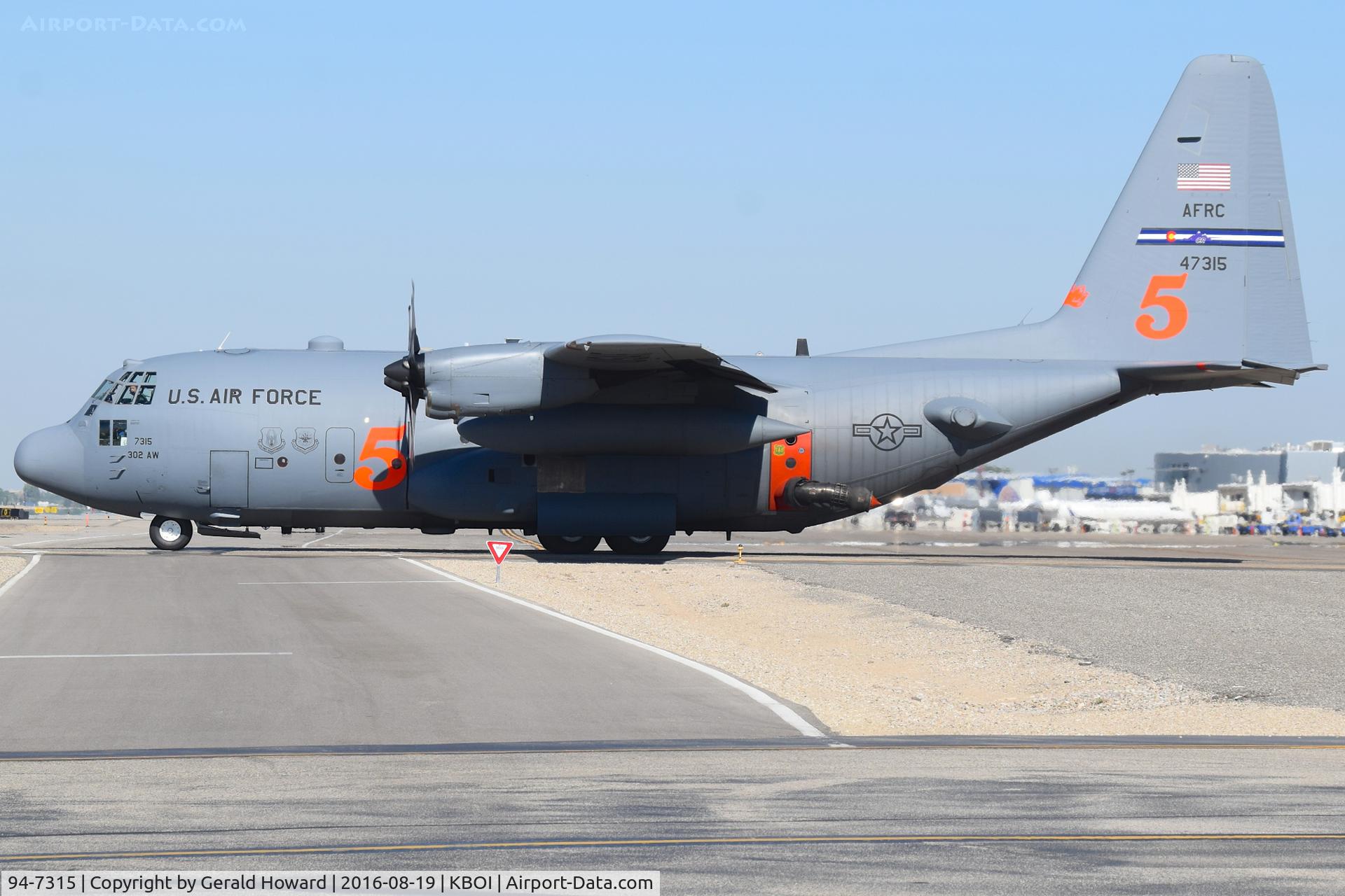 94-7315, Lockheed C-130H C/N 382-5389, Tanker 5 taxing from NIFC ramp to RWY 28R. Equipped with MAFFS. 302nd Air Wing – Peterson AFB, CO
