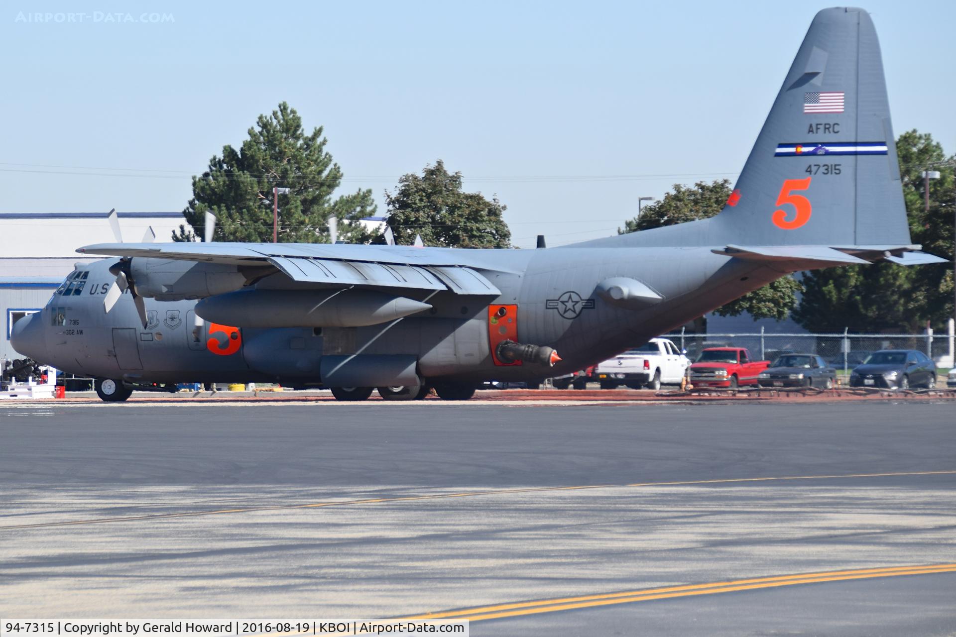 94-7315, Lockheed C-130H C/N 382-5389, Tanker 5 parked on NIFC ramp for slurry refill. Equipped with MAFFS. 302nd Air Wing – Peterson AFB, CO