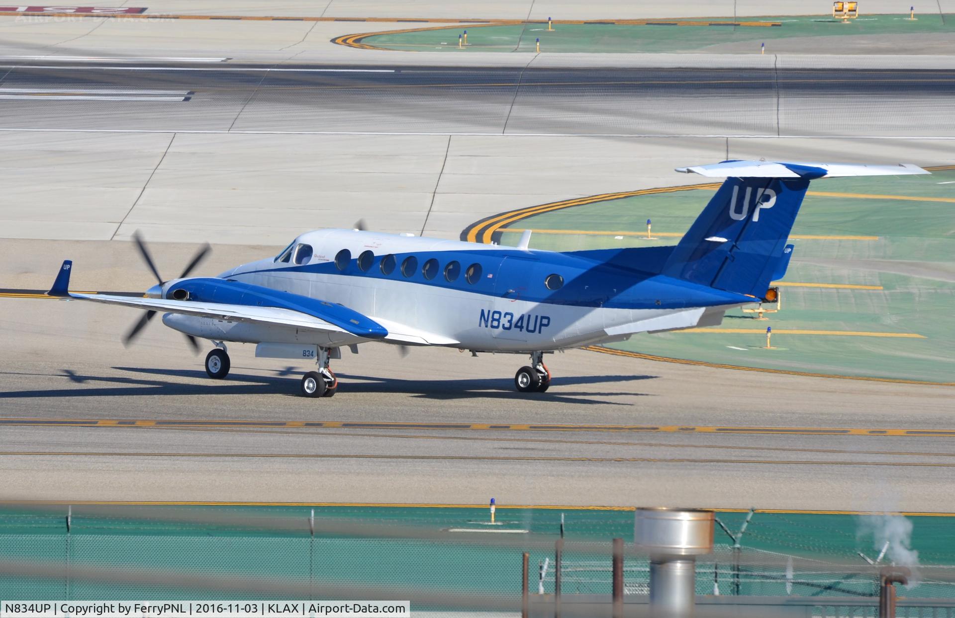 N834UP, 2014 Beech B300 350 King Air C/N FL-963, Be350 waiting to cross the runways.