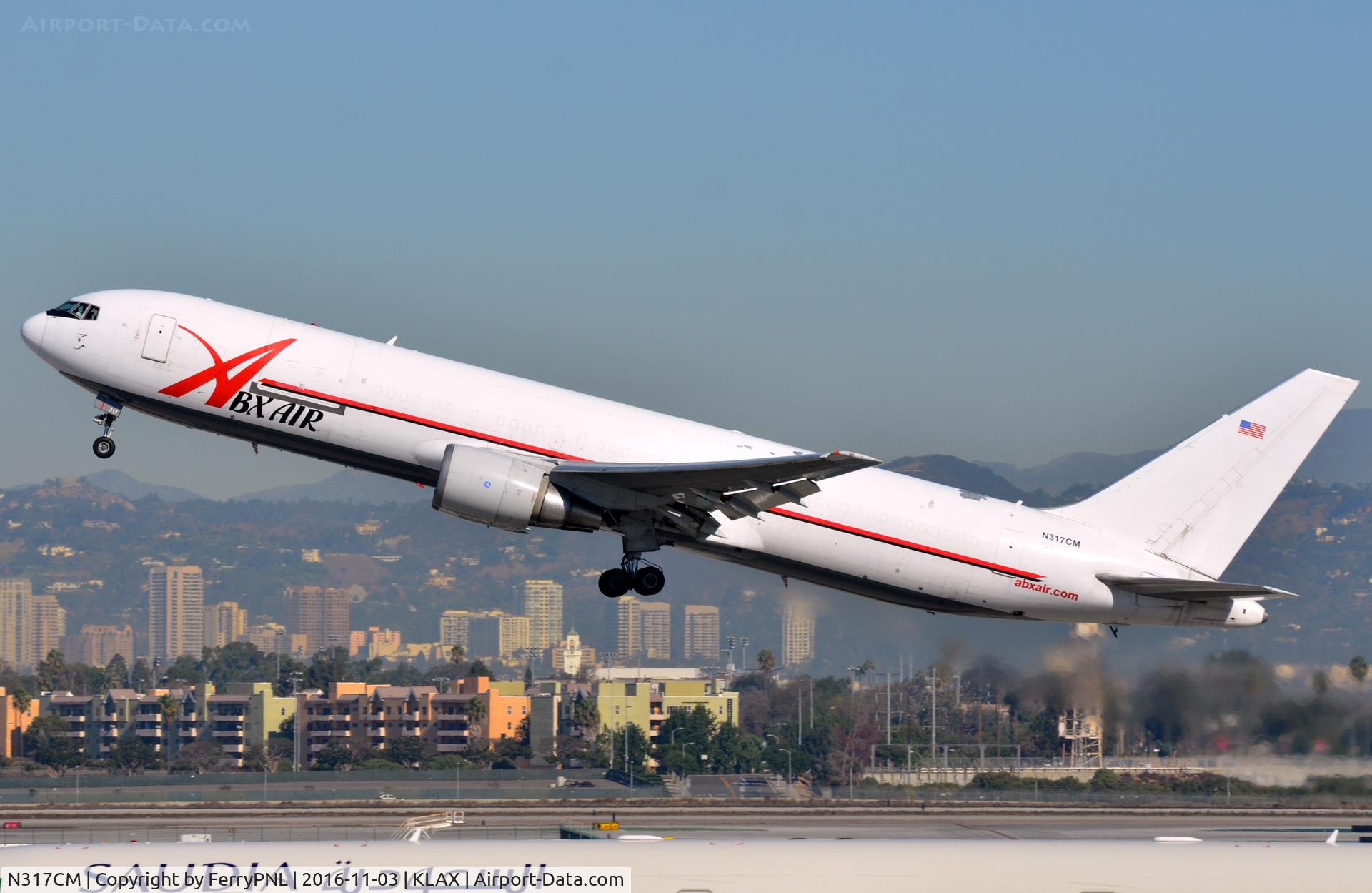 N317CM, 1988 Boeing 767-338 C/N 24317, ABX B763F taking-off from LAX.
