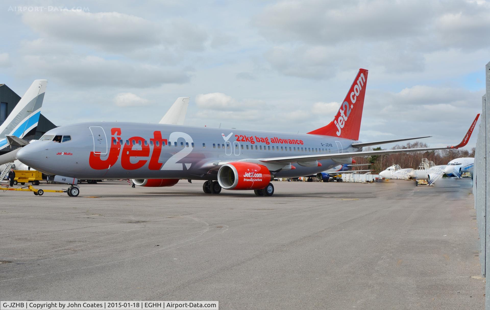 G-JZHB, 2000 Boeing 737-8K5 C/N 28623, Exits paintshop after repaint