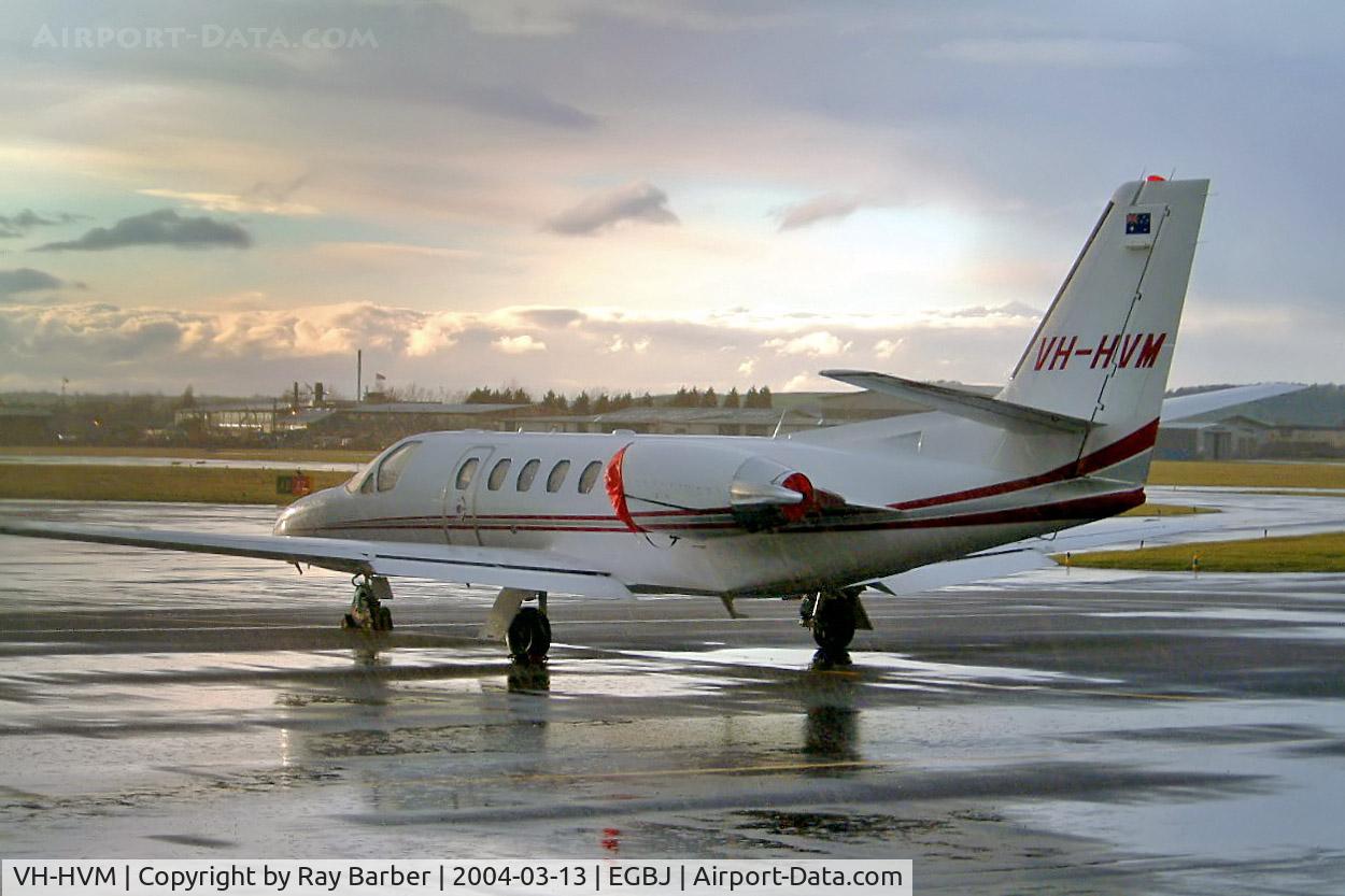 VH-HVM, 2001 Cessna 550 Citation Bravo C/N 550-0984, Cessna Citation Bravo [550-0984] Staverton~G 13/03/2004. Taken in a rainstorm as the sun is setting.