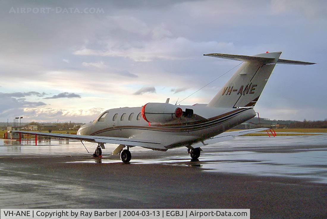 VH-ANE, 2004 Cessna 525 CitationJet CJ1 C/N 525-0521, Cessna CitationJet CJ1 [525-0521] Staverton~G 13/03/2004. Taken in a rainstorm as the sun is setting.