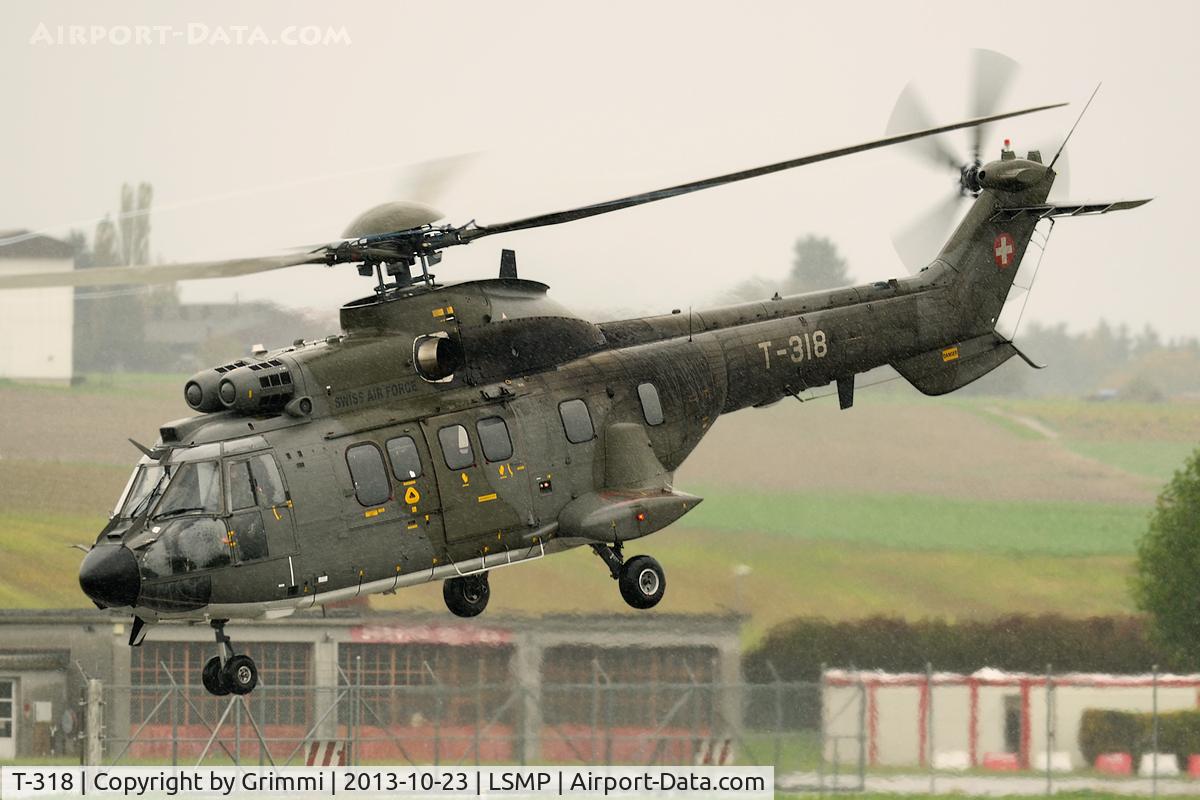 T-318, Aerospatiale TH89 Super Puma (AS-332M1) C/N 2340, Modernized TH06 in very heavy rain, turning in a very sad day some minutes later (crash of Hornet D J-5237)